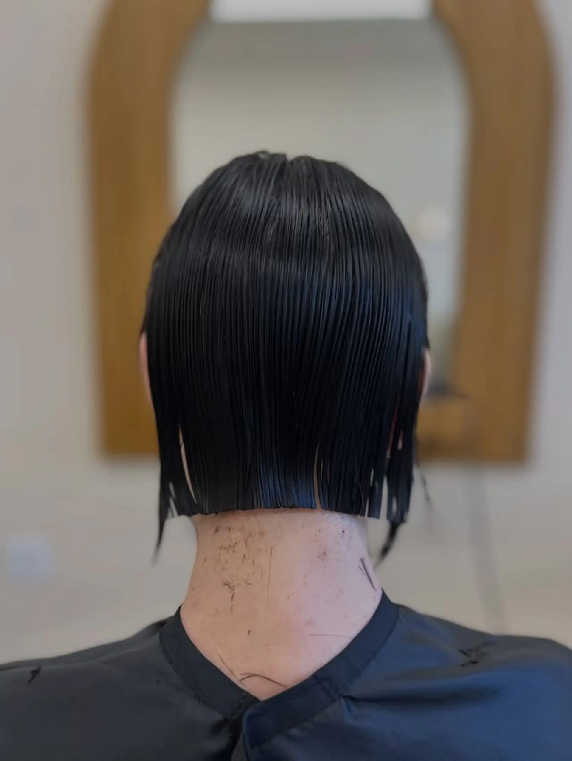 This is a sleek, short blunt bob haircut. 1