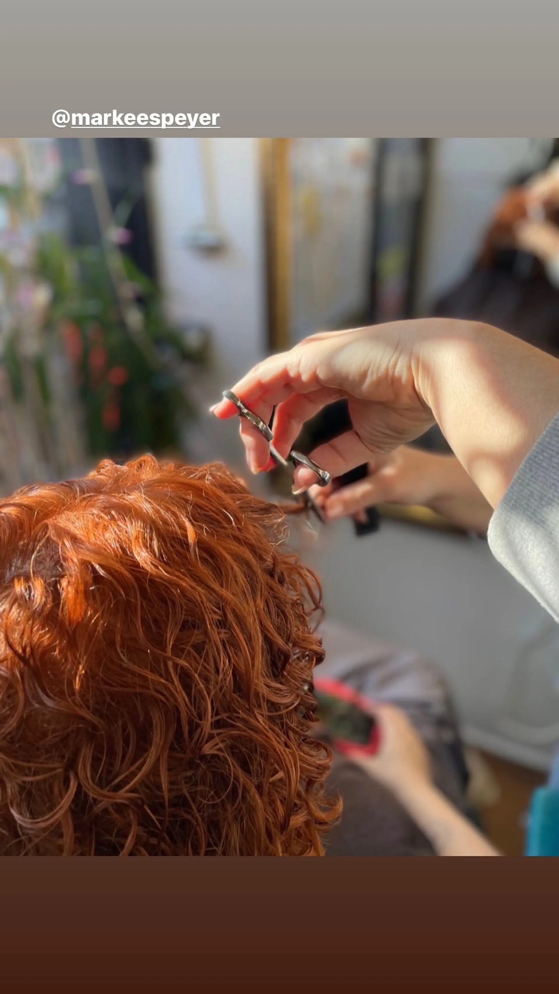 A short, layered shag haircut that enhances natural curls and adds volume. 1