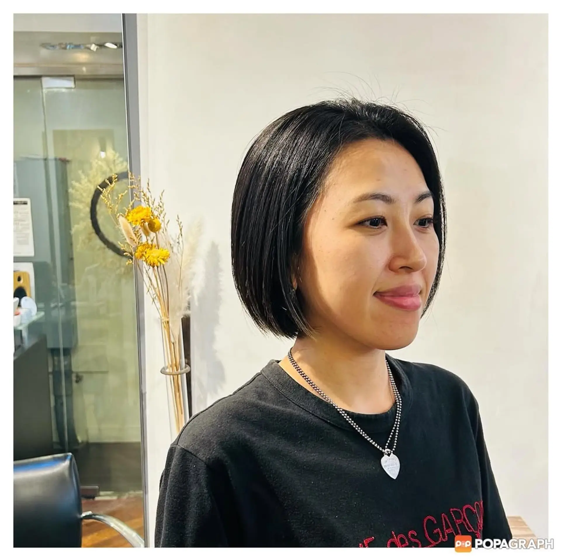 A classic chin-length bob with a sleek, straight finish. 1