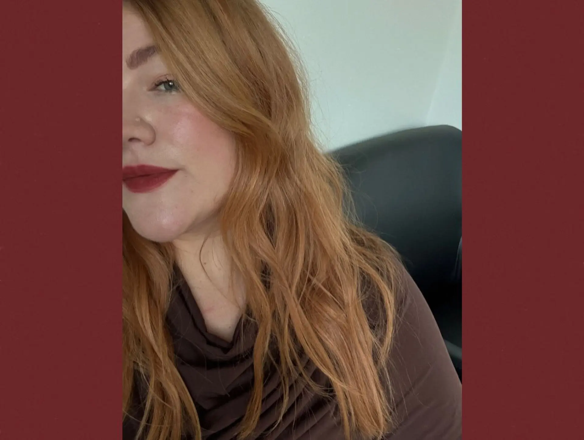 Long warm copper and strawberry blonde hair styled in loose waves. 1