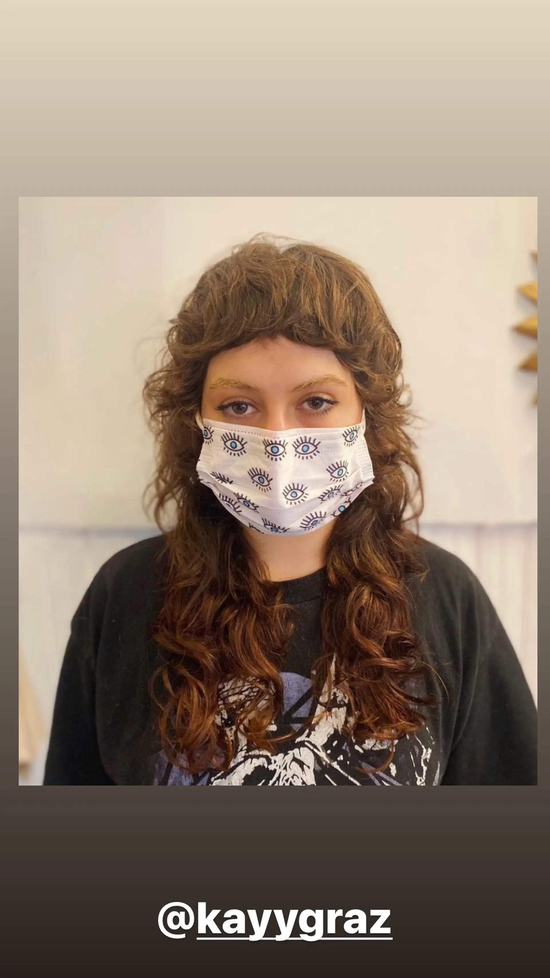 A layered, wavy shag with curtain bangs. 1