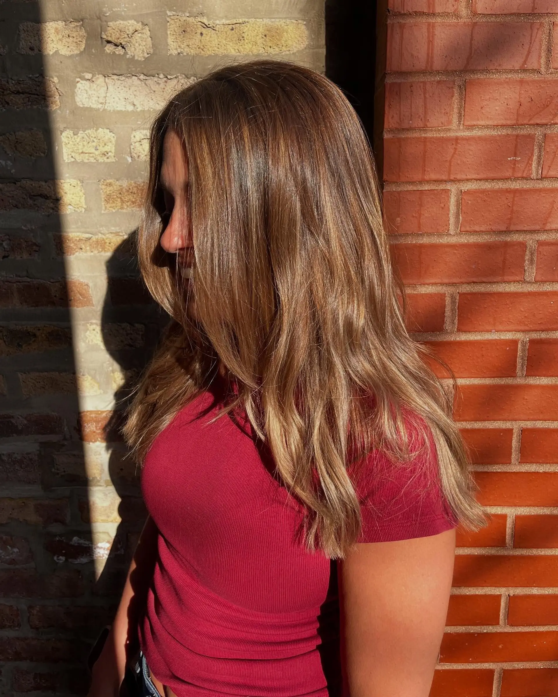 Long, layered, straight hair with a bronde balayage. 1