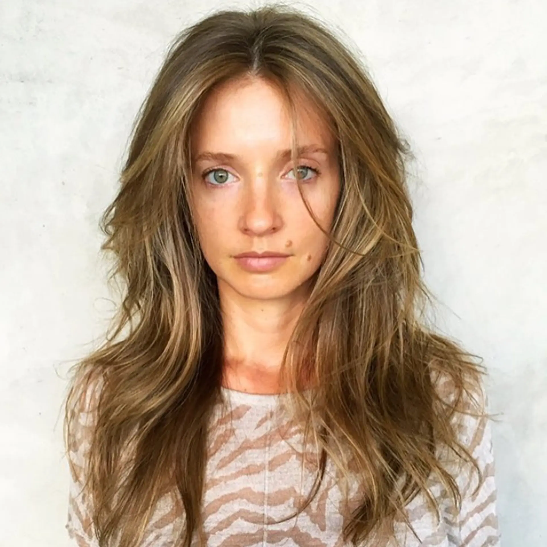 Tousled long bronde layers with soft face-framing pieces and natural texture. 1