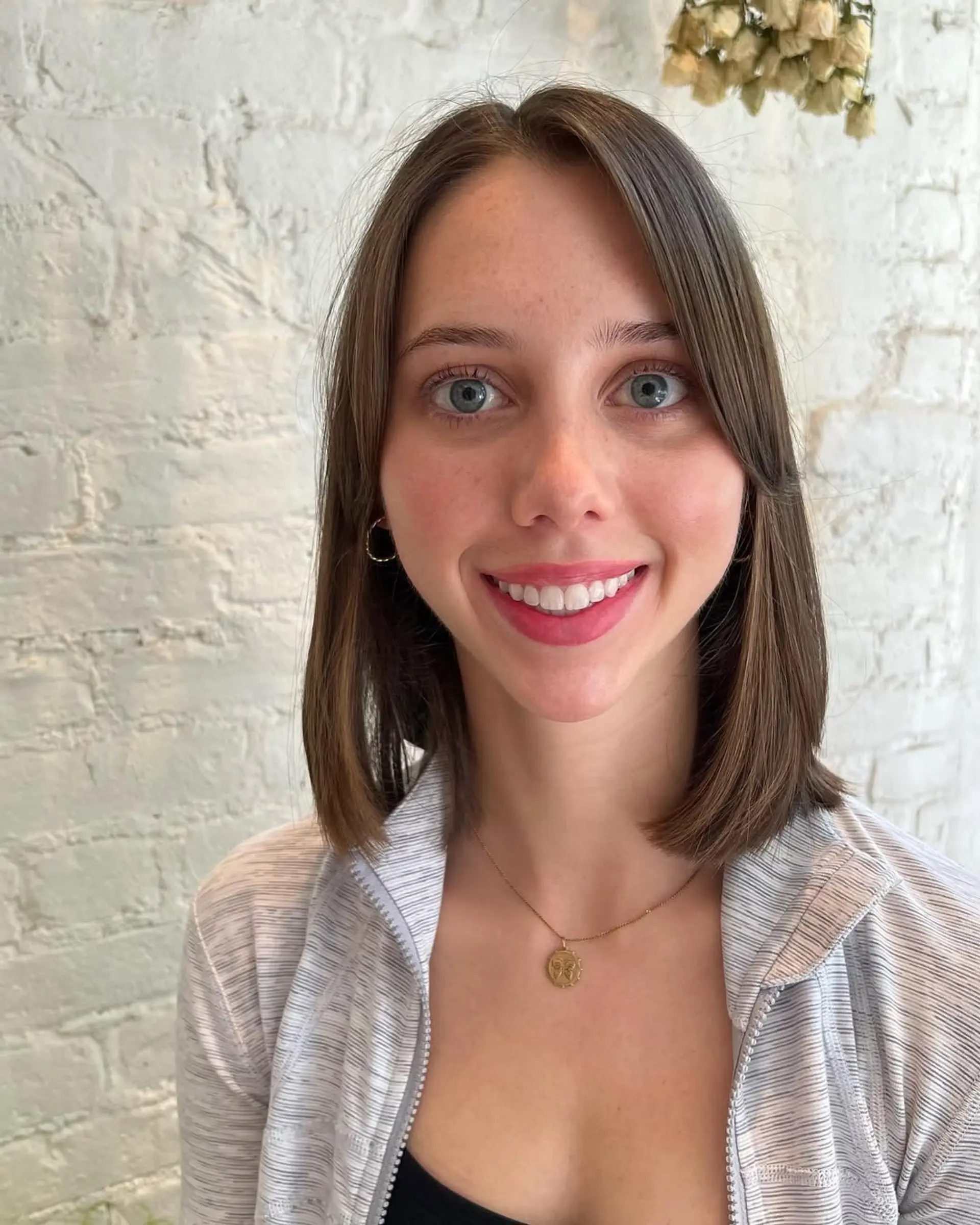 A sleek lob with subtle face-framing bangs. 1