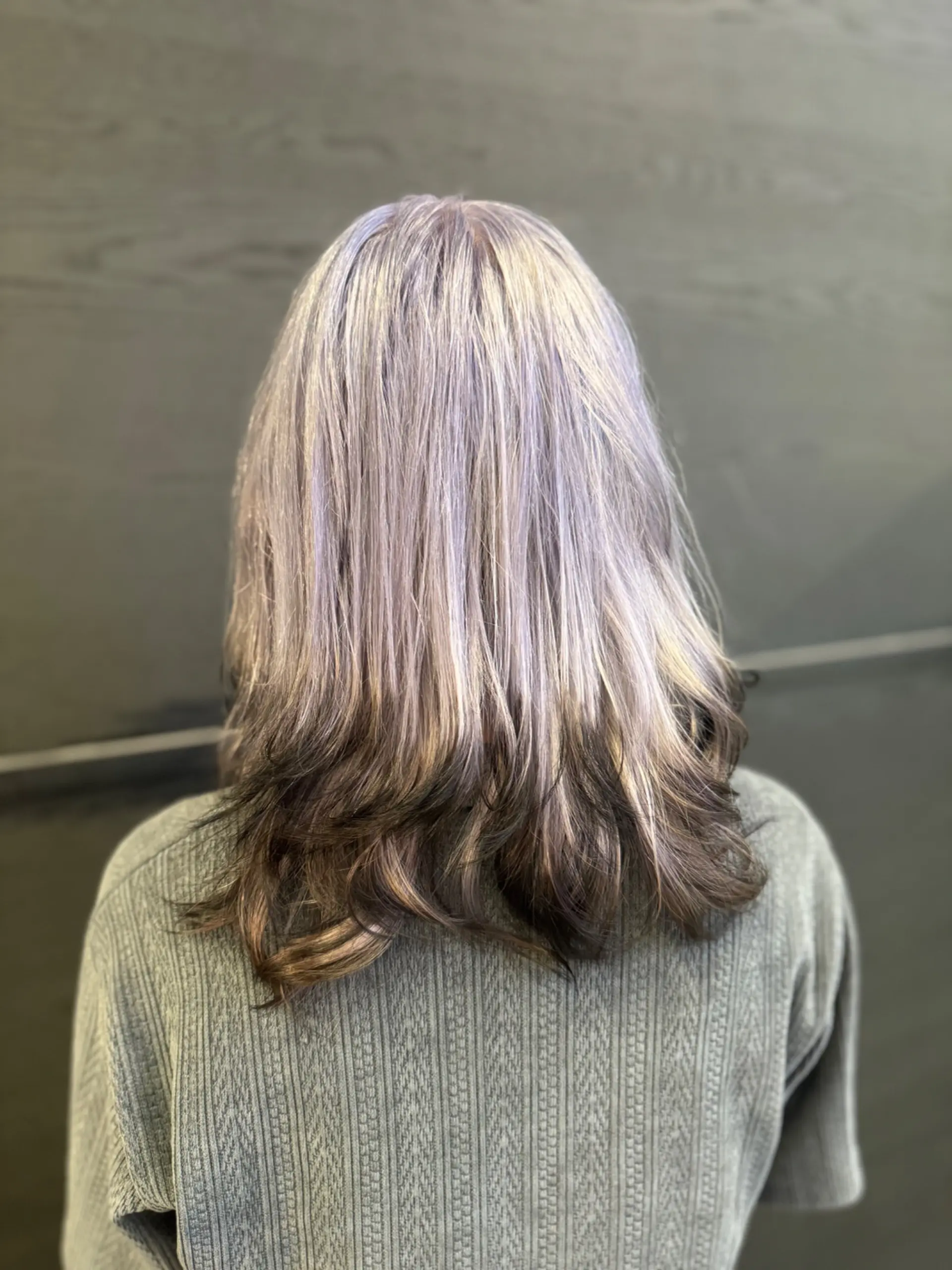 Medium length straight hair featuring a trendy ash blonde to dark brown ombre. 1