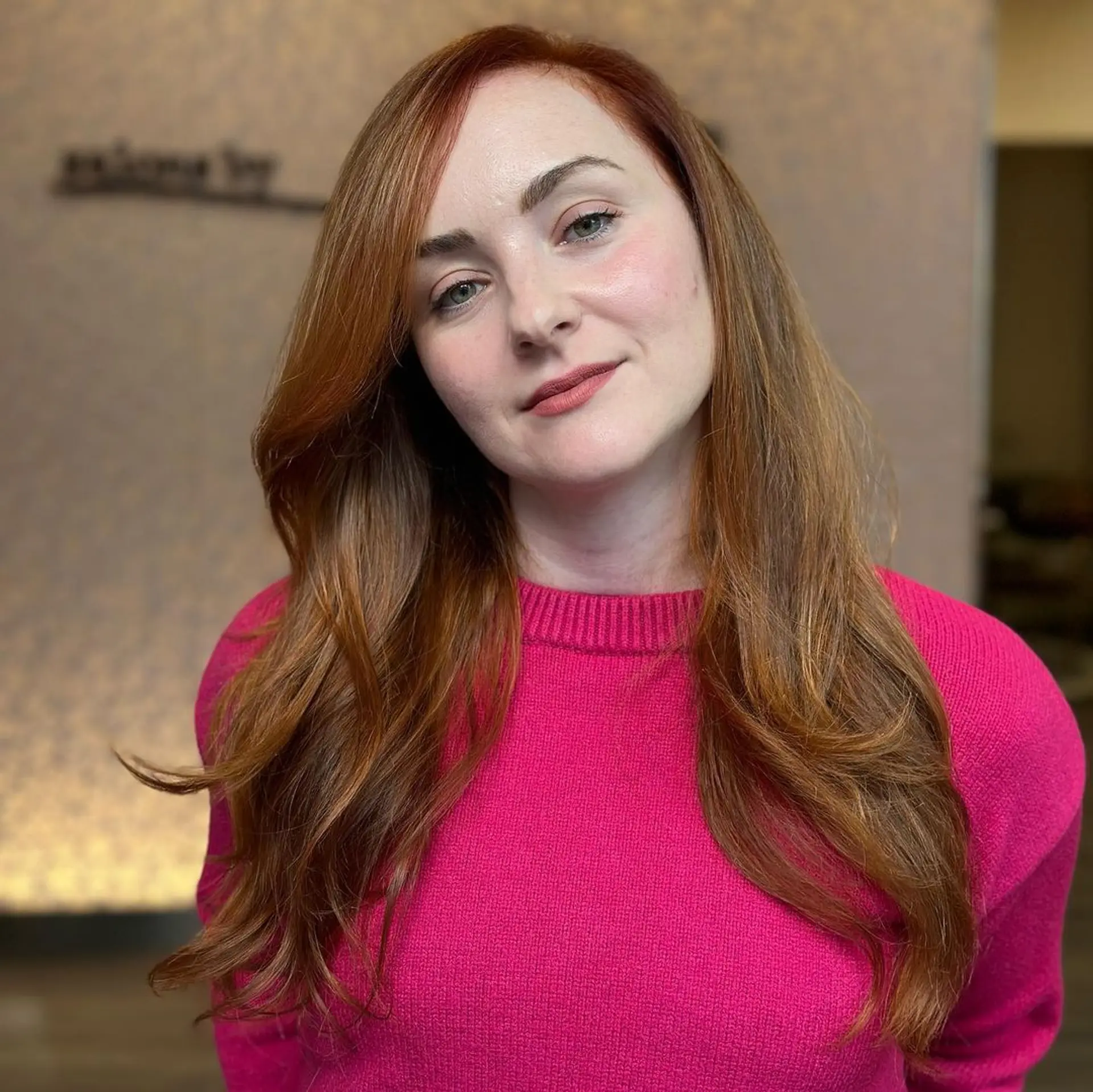 Long, wavy copper-red hair with side-swept bangs and subtle layers.

Color by @simabeautynyc
Cut and style by @juliamannino_hair
 2