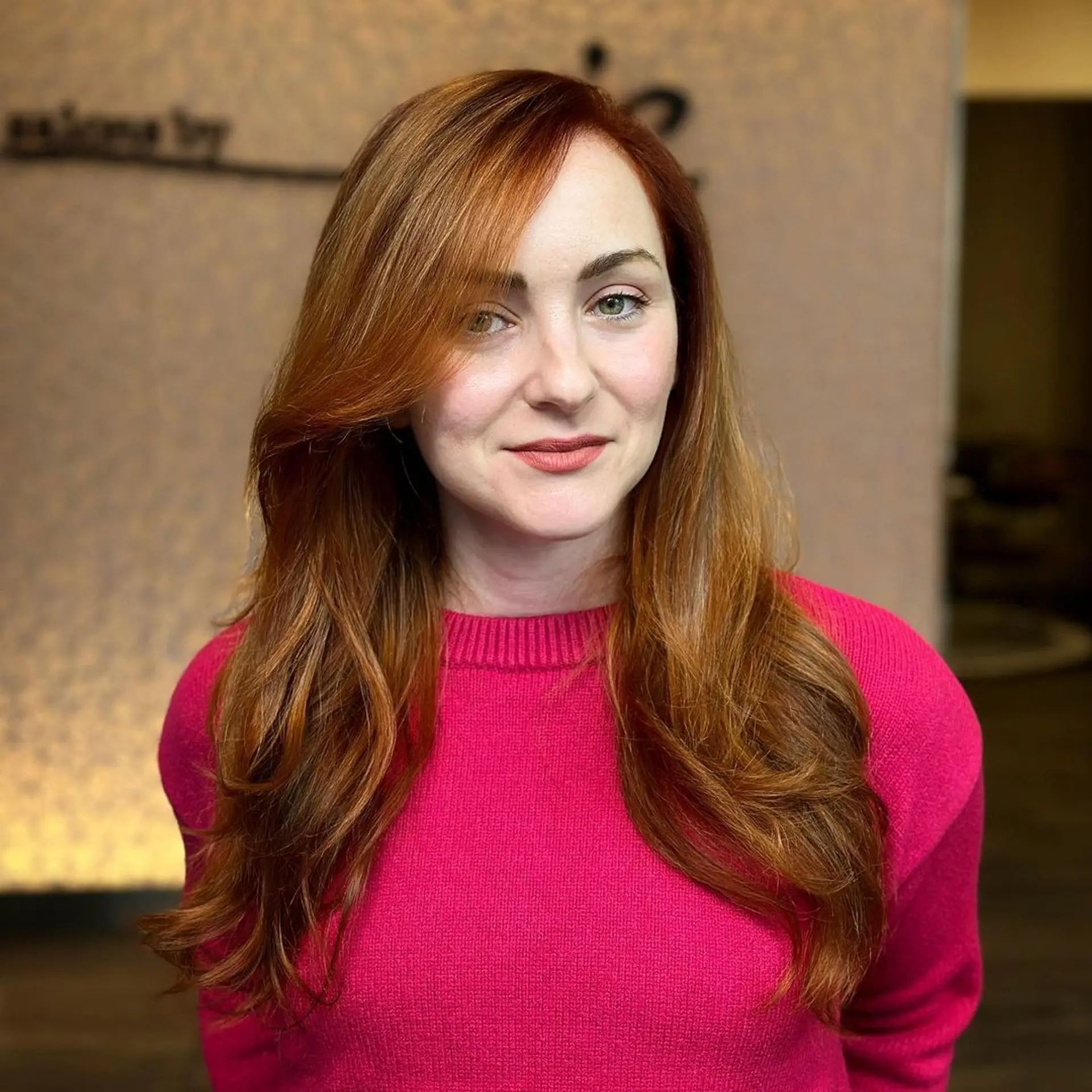 Long, wavy copper-red hair with side-swept bangs and subtle layers.

Color by @simabeautynyc
Cut and style by @juliamannino_hair
 3