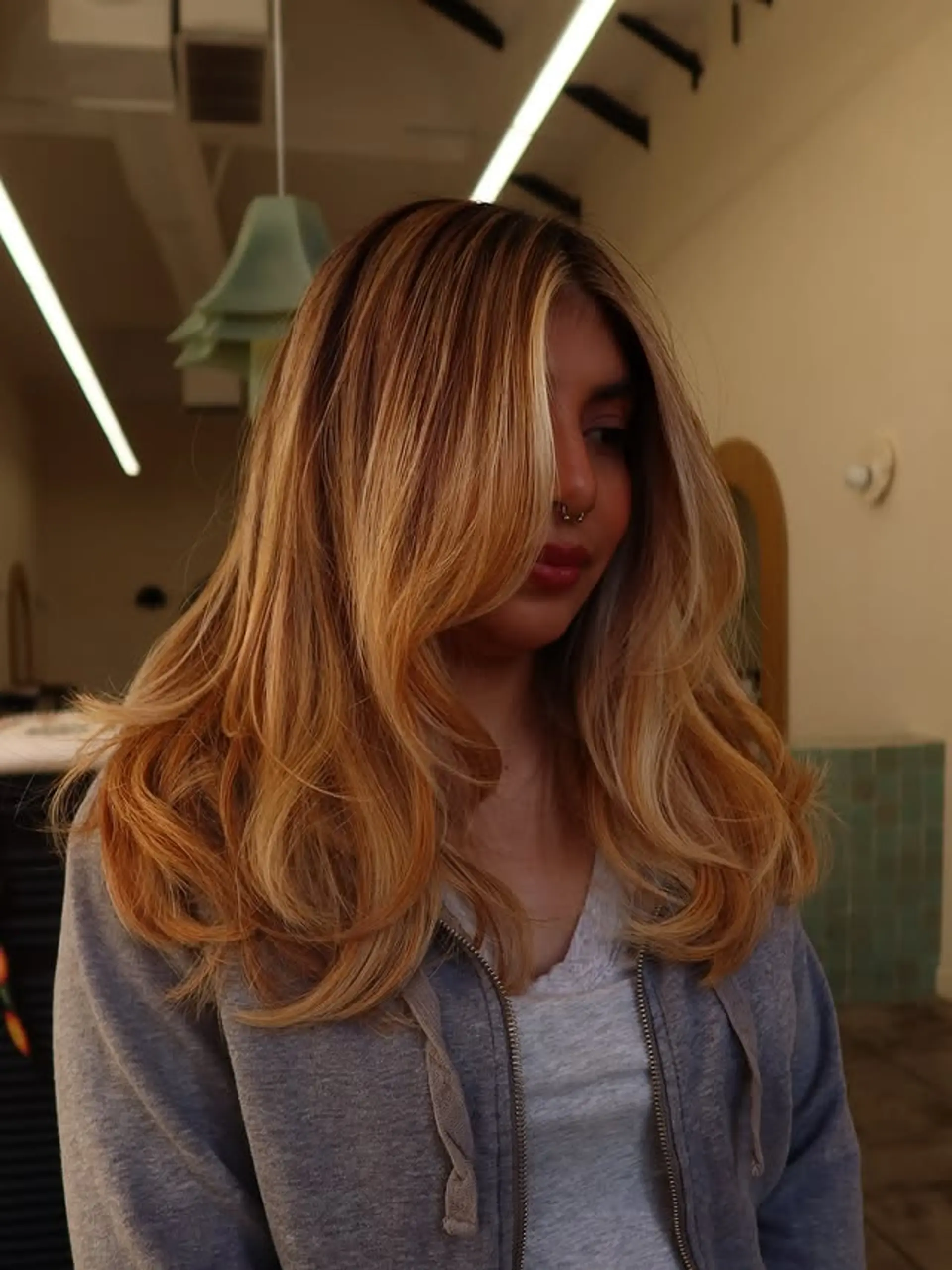 Long, wavy hairstyle with layers for movement and soft waves. 1