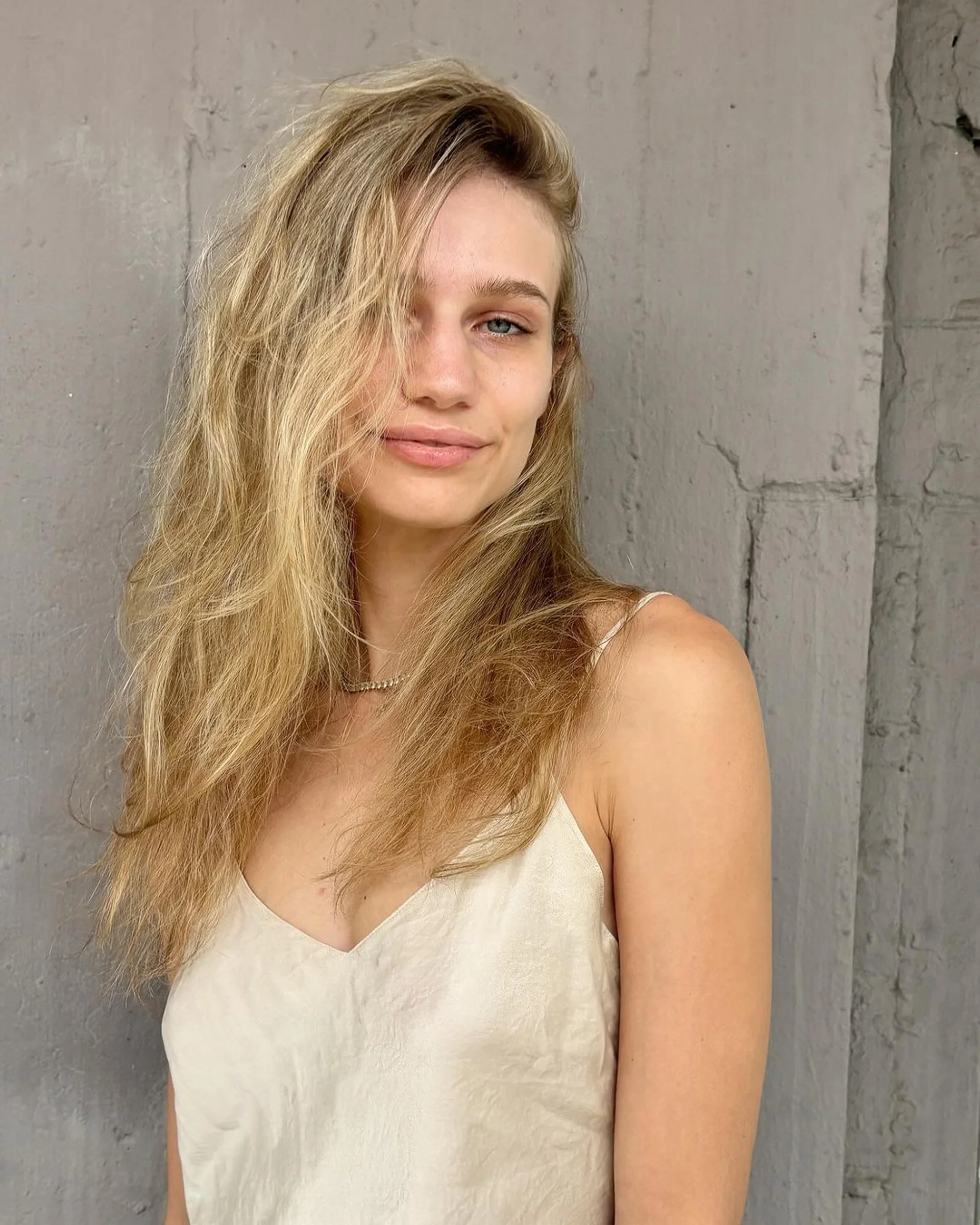 Medium-length bronde long bob with beach waves, showcasing a popular 2025 hairstyle trend. - Preview 2