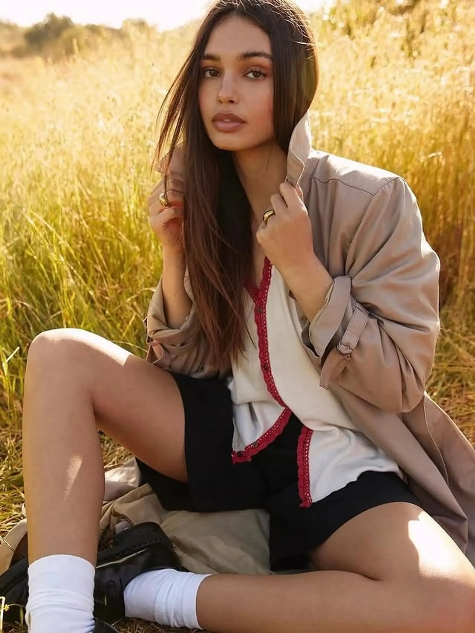 Long layered brunette hairstyle with a relaxed and effortless style. 1