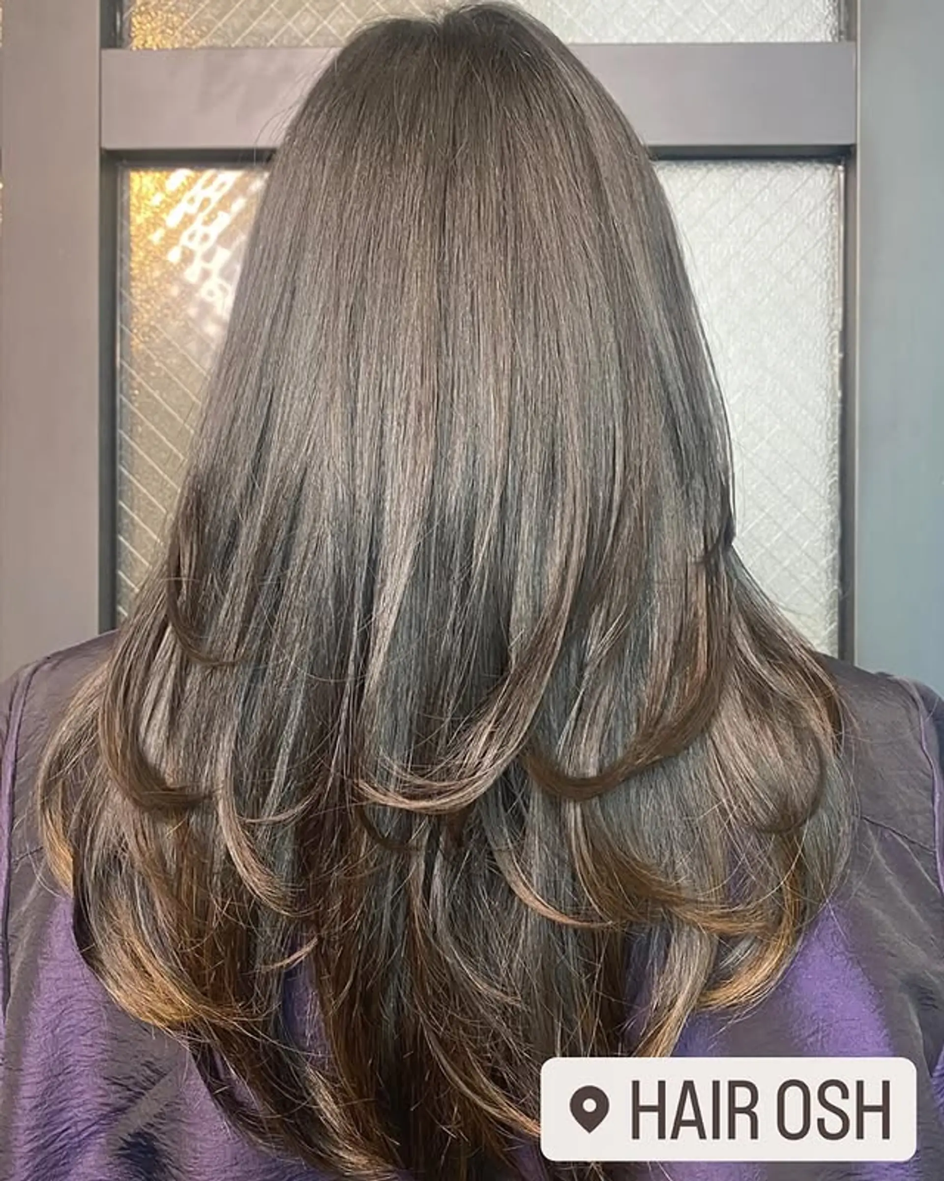 Long layered haircut with ash brown balayage. 1