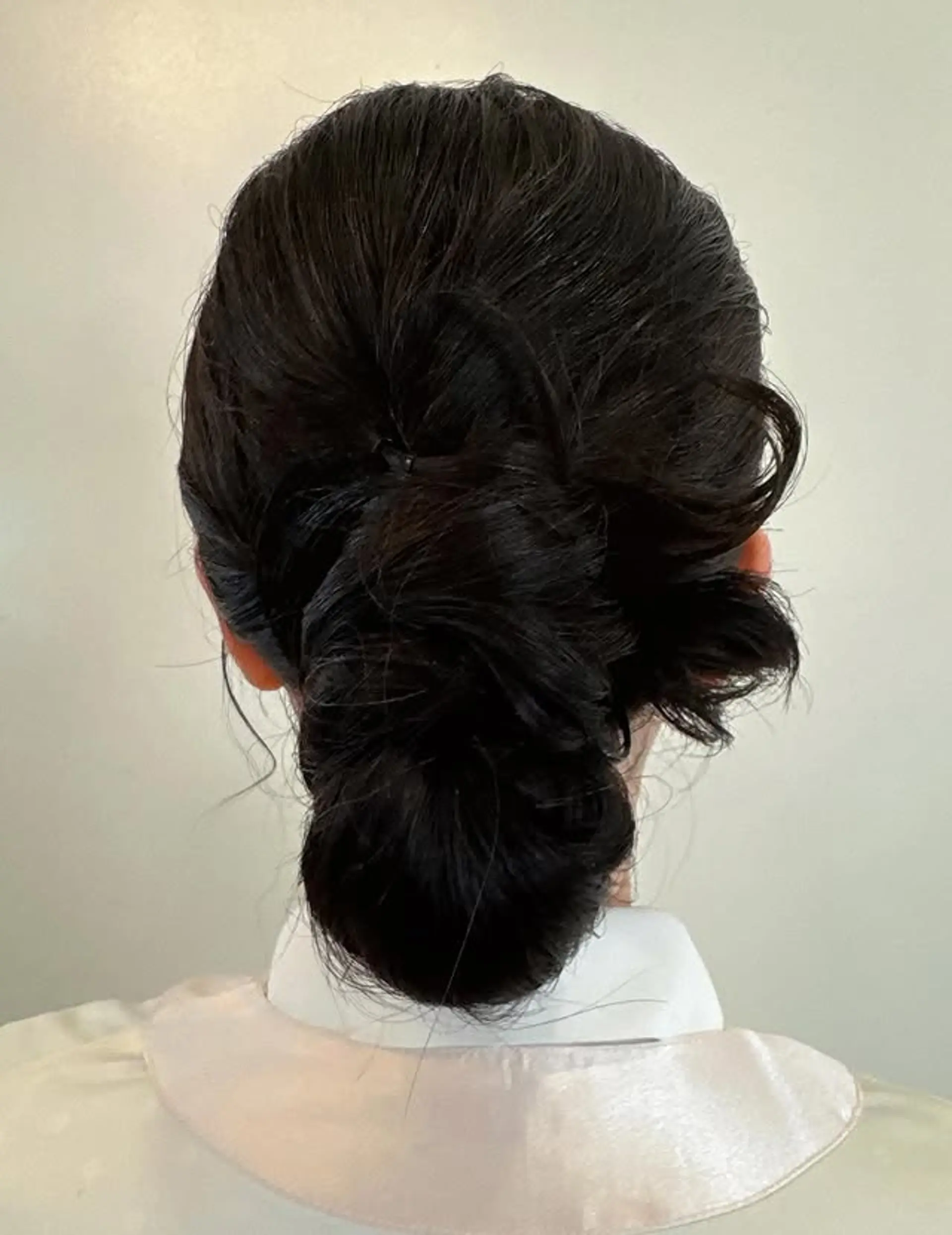 A classic and elegant low bun updo. 1