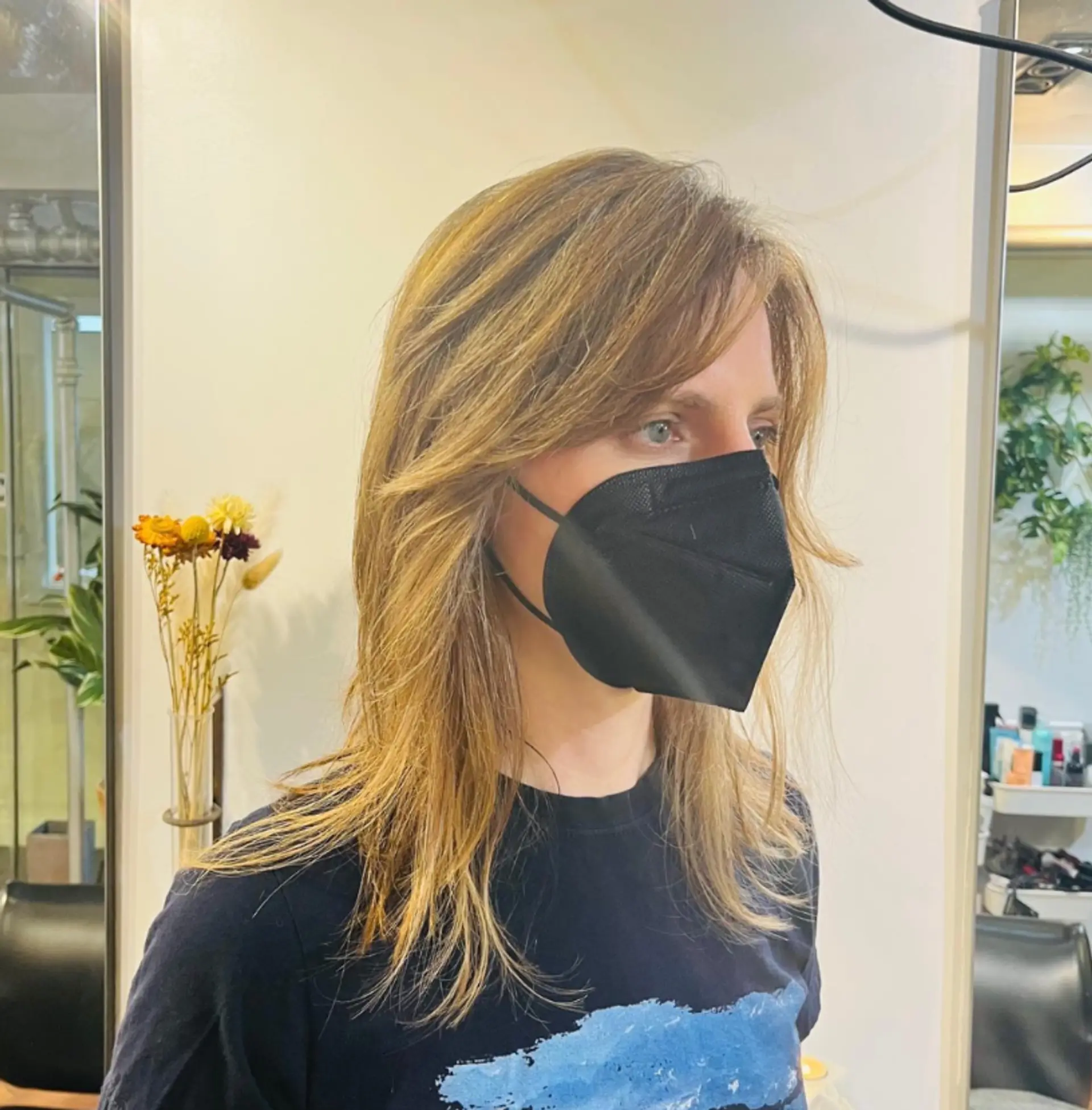 A modern shag haircut featuring soft, face-framing layers that enhance natural waves and texture. 1