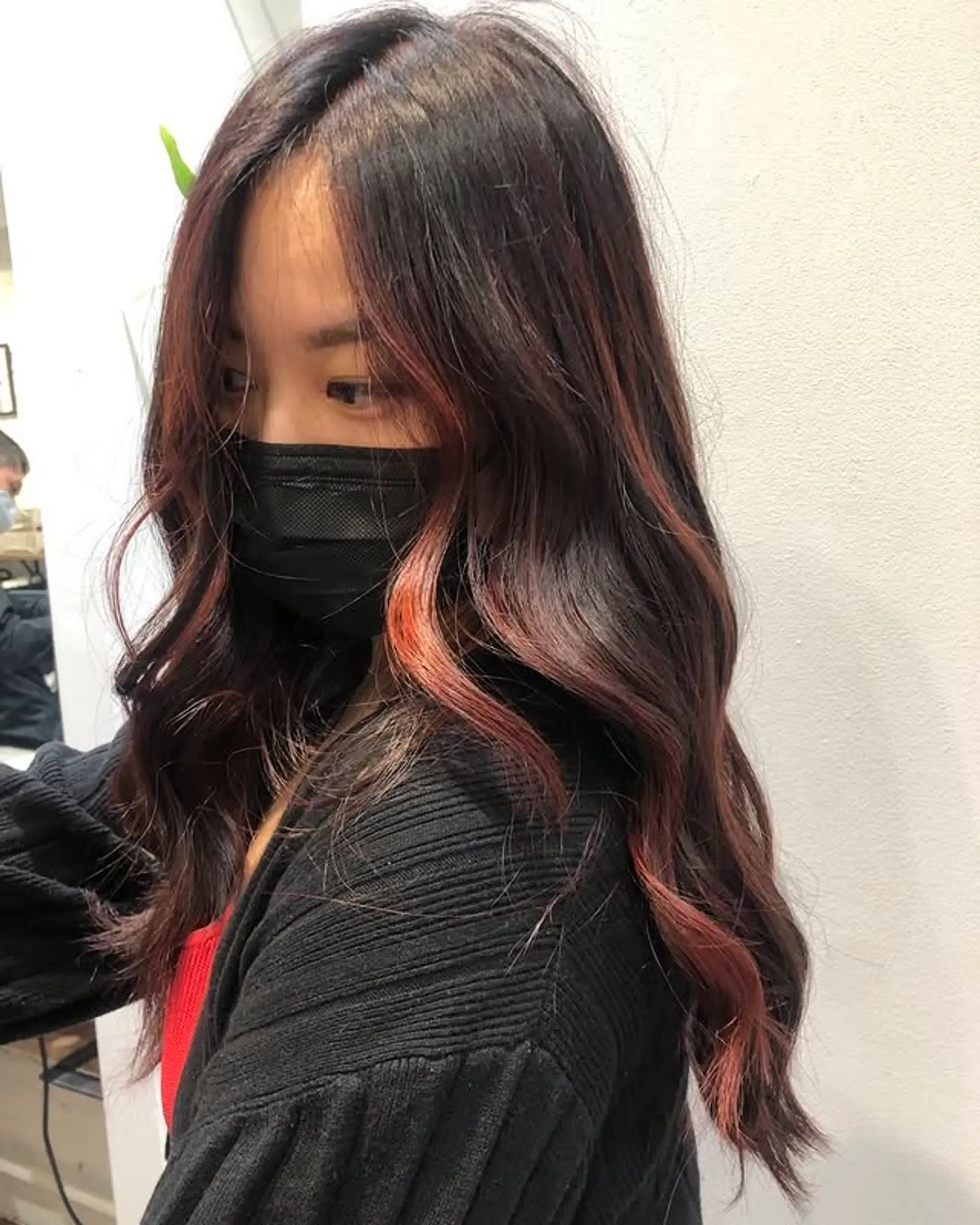 Long, wavy hair with chocolate brown base and red highlights. 1