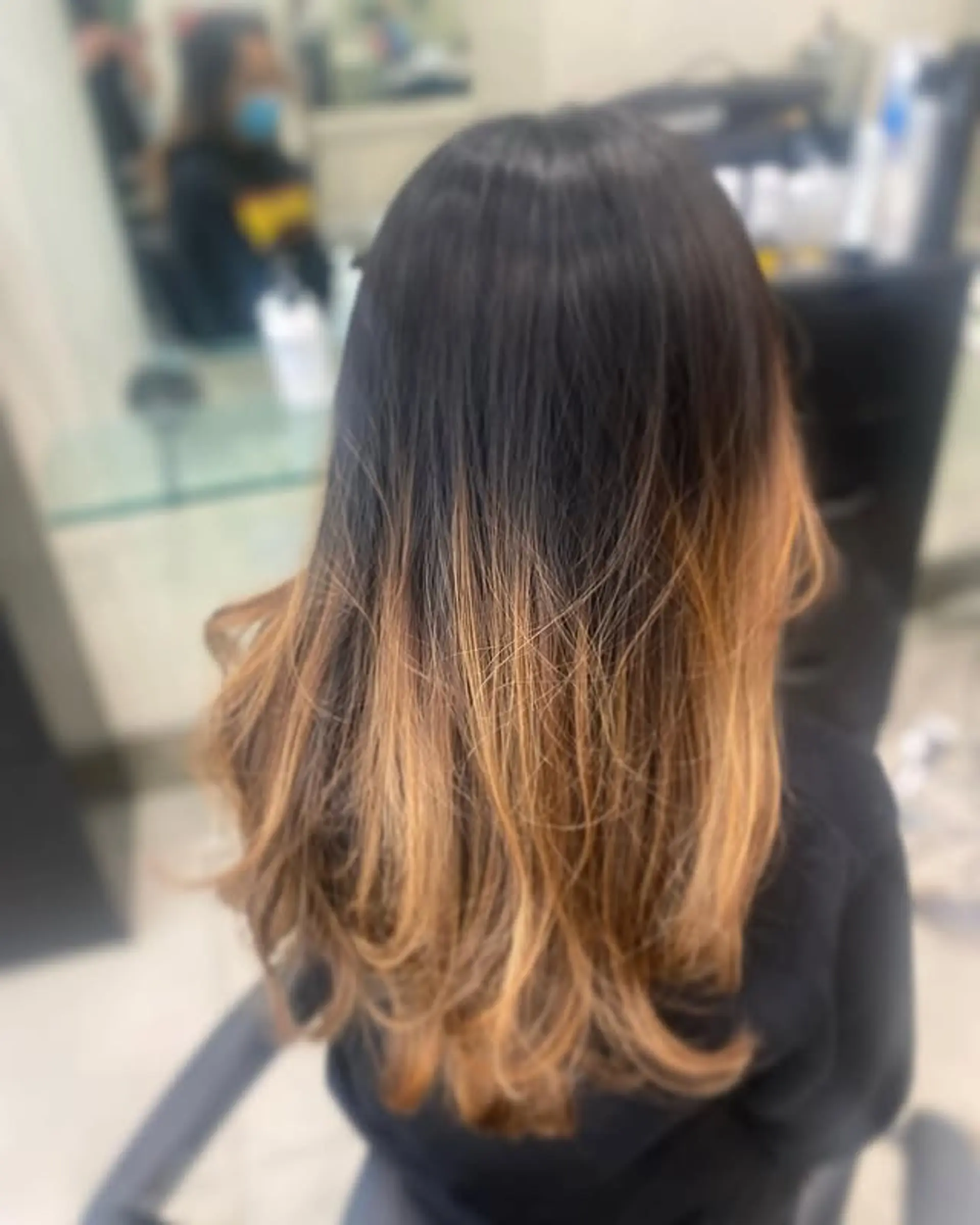Ombre with beach waves that transition from dark roots to blonde ends. 1