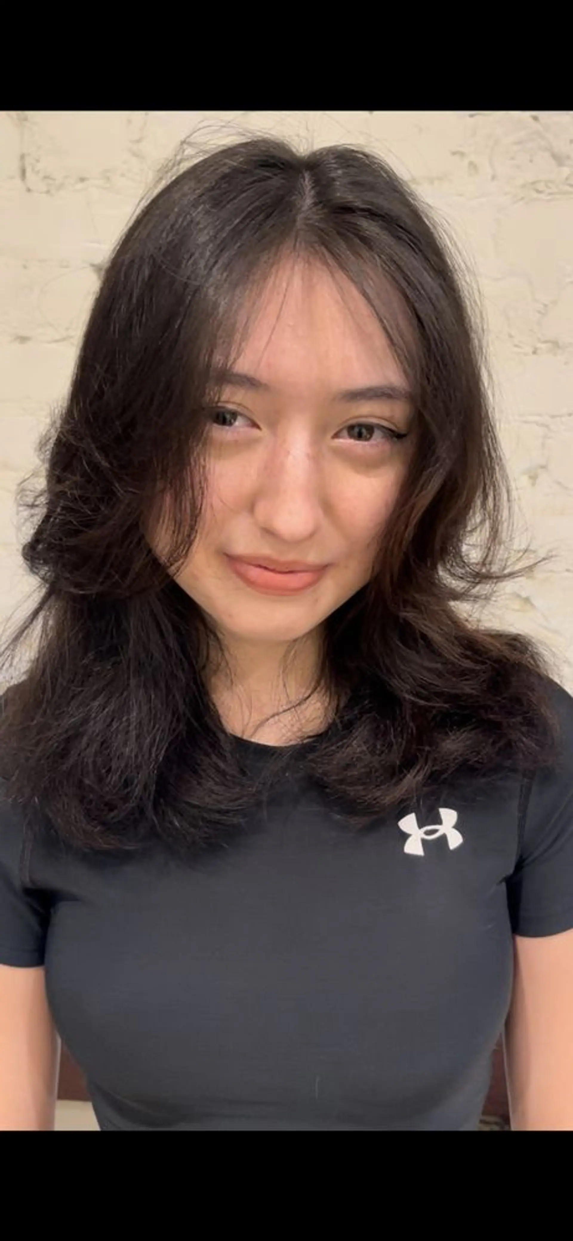 A trendy shoulder-length shag haircut with layers and face-framing. 1