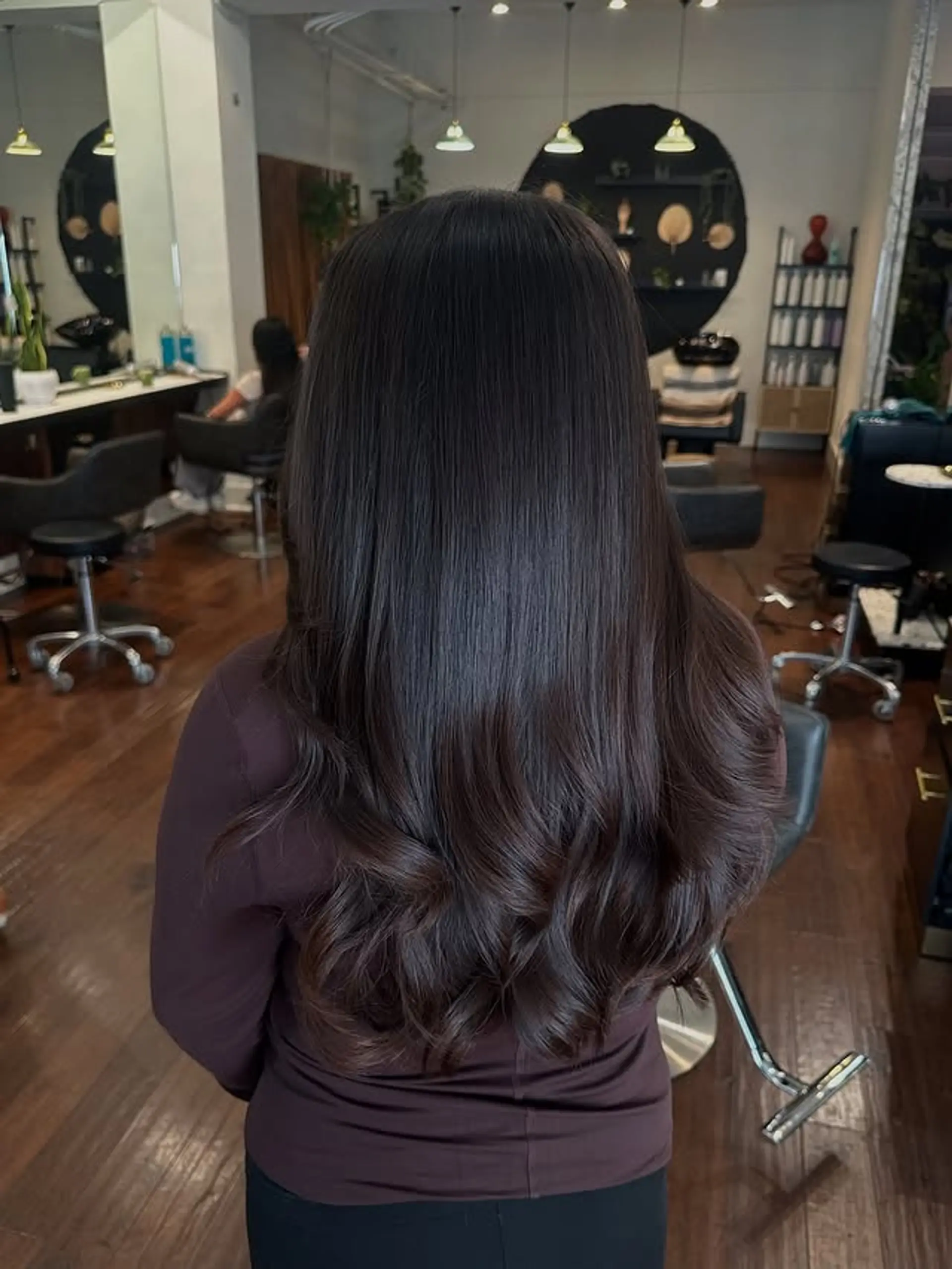 Long, straight hair with soft waves at the ends for a polished and elegant look. 1