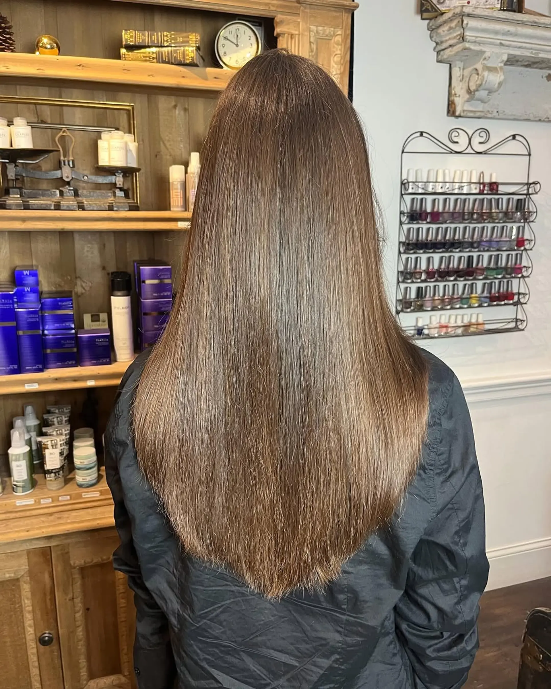 Long, chestnut brown straight hair with a middle part, featuring face-framing layers and a glossy finish. 3