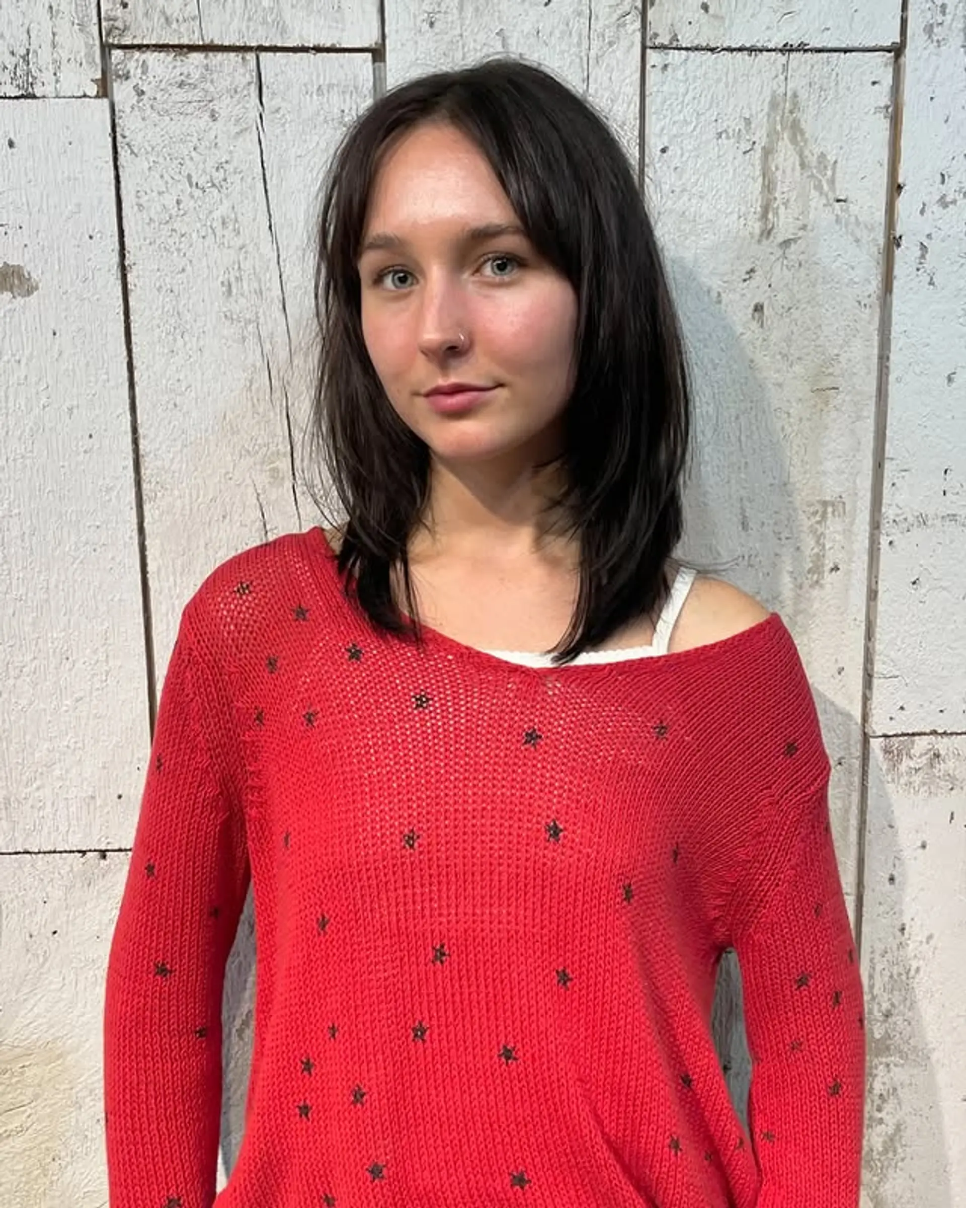 A medium-length shag with curtain bangs and layers. 1