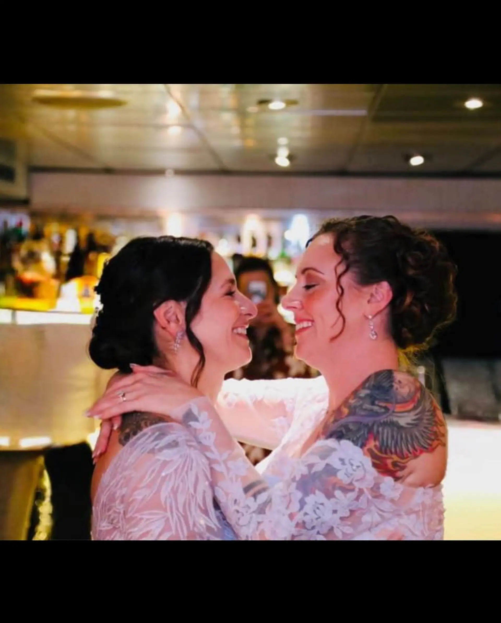 Romantic bridal updos styled with soft texture, curls, and face-framing tendrils. 1