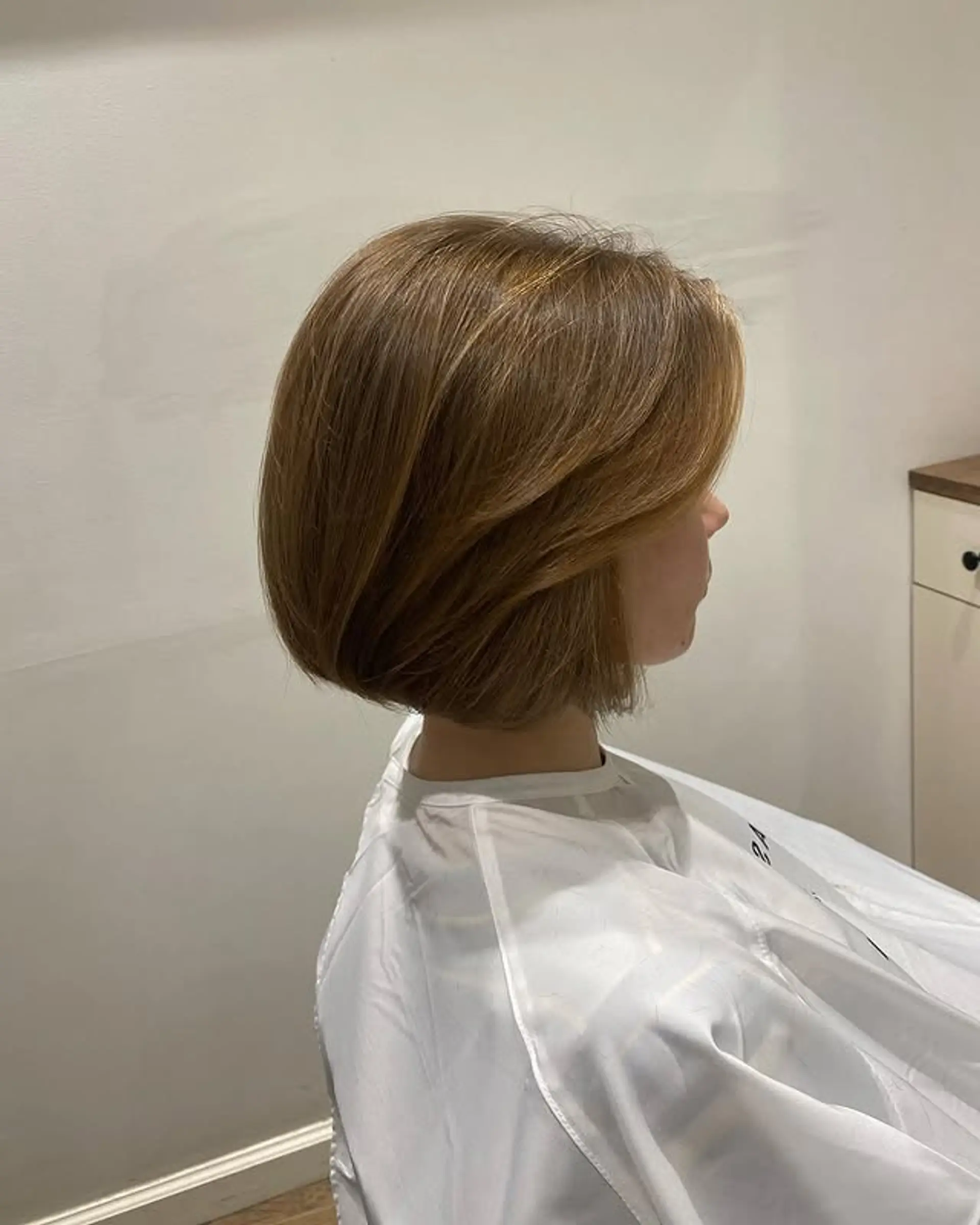 A stylish, layered bob with face-framing layers. 1