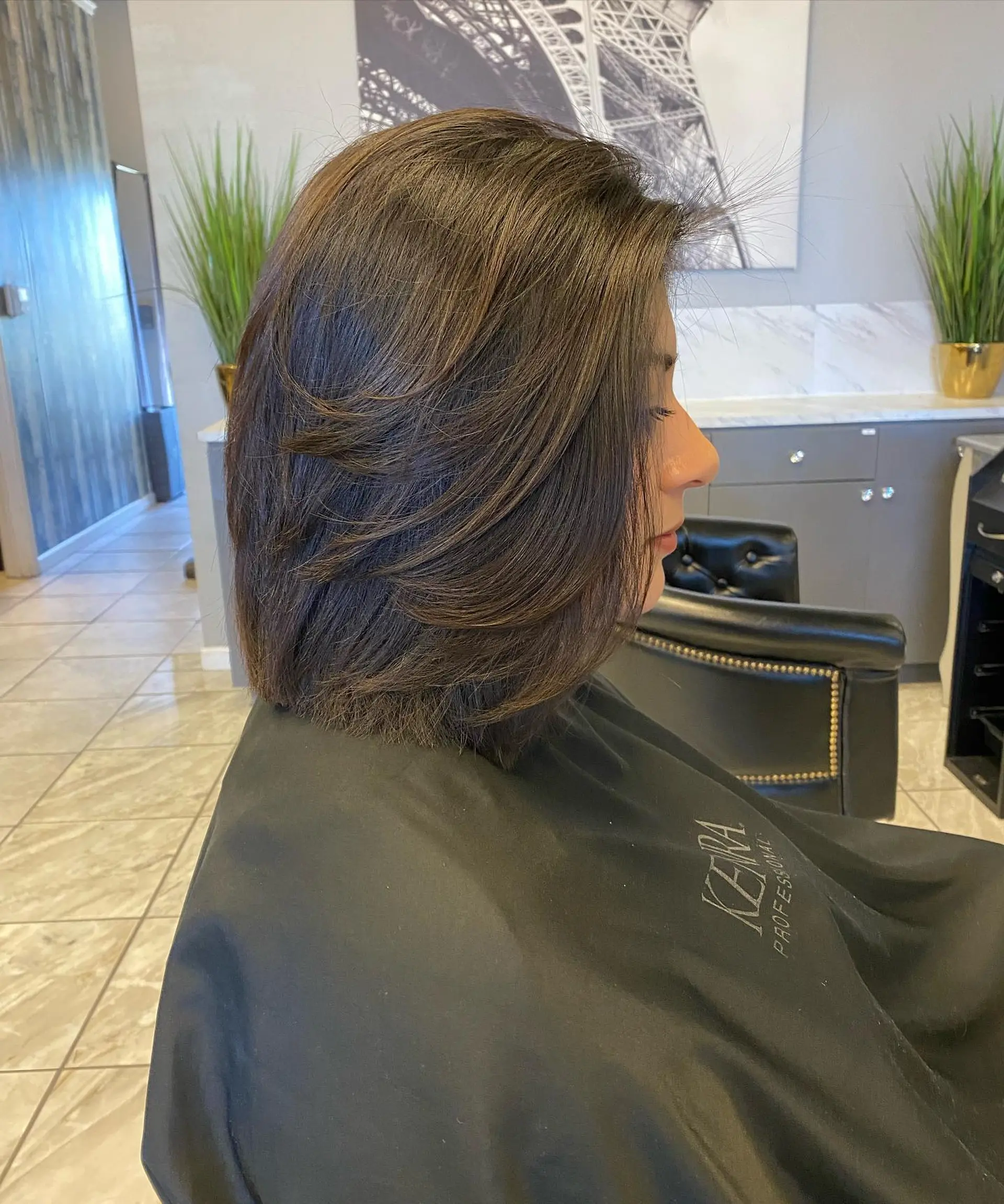 A classic layered bob with a blunt cut, creating a modern and chic look. 1