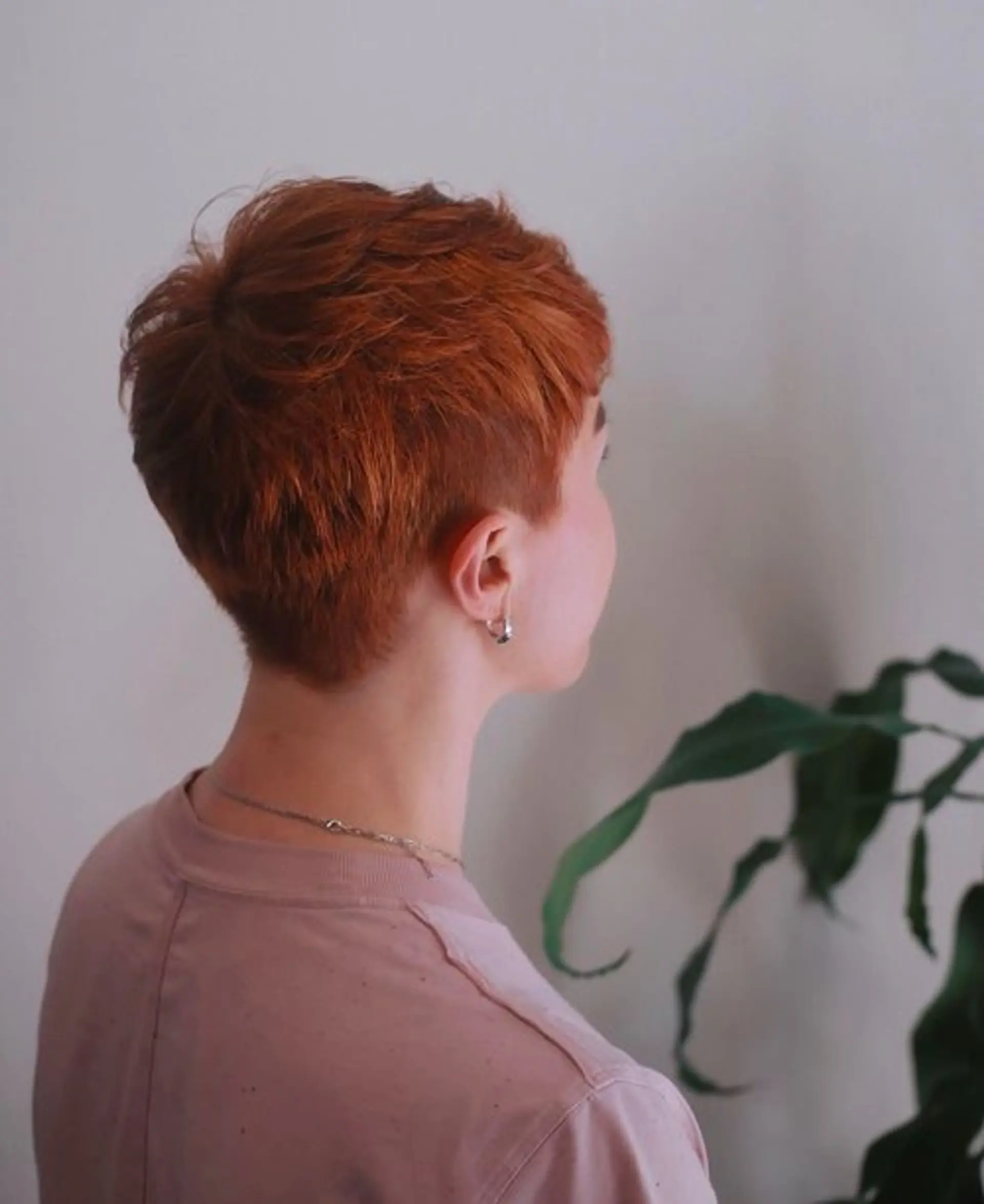 Short, textured pixie cut with an undercut. 1