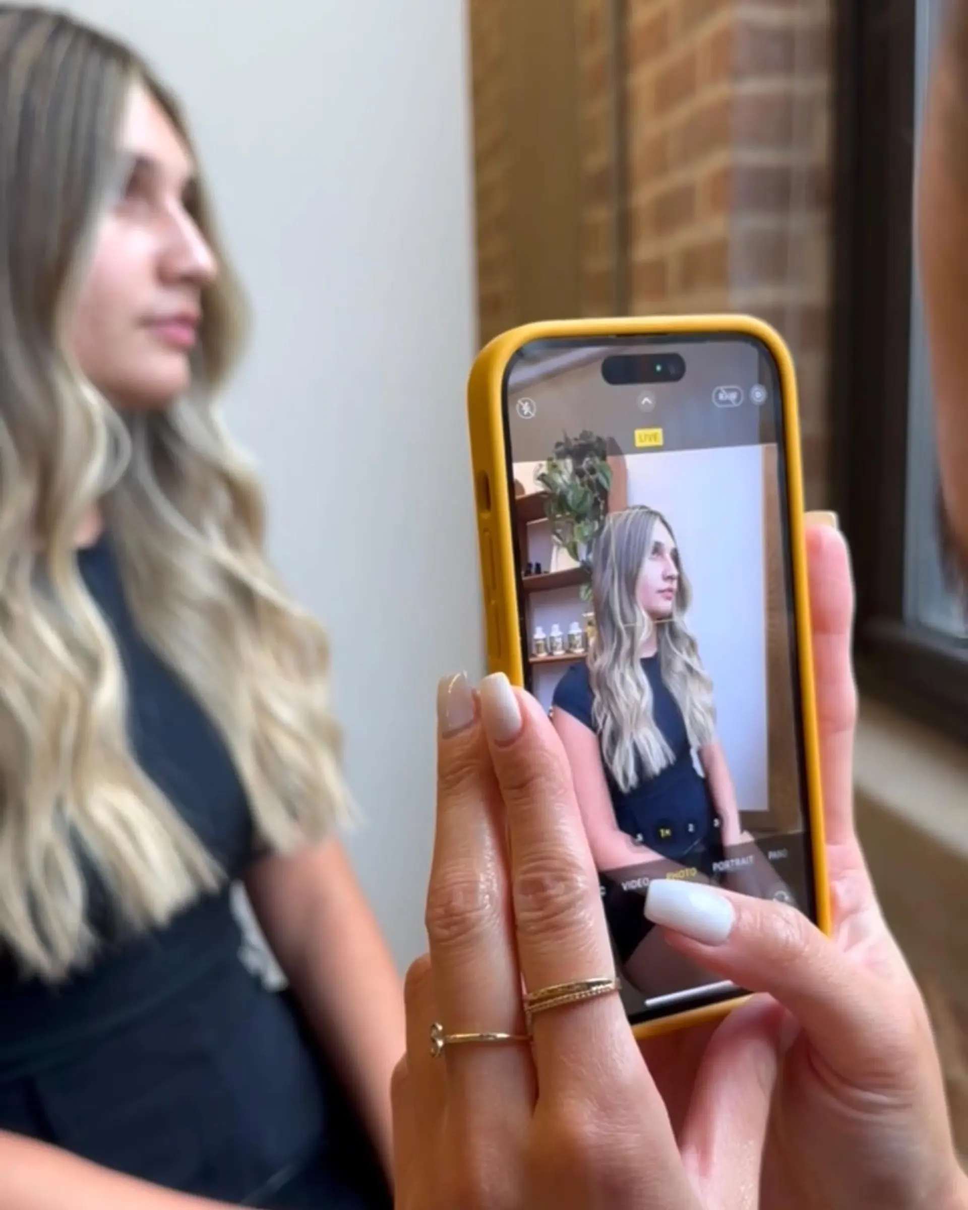 Long, beachy waves with a blonde balayage and ombre color melt. 2