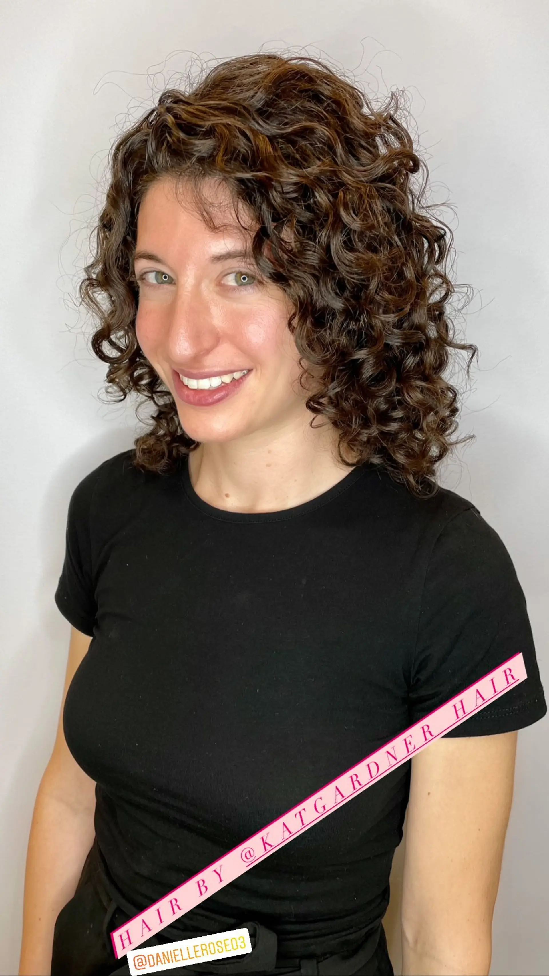 A layered curly shag with defined, bouncy curls. 1