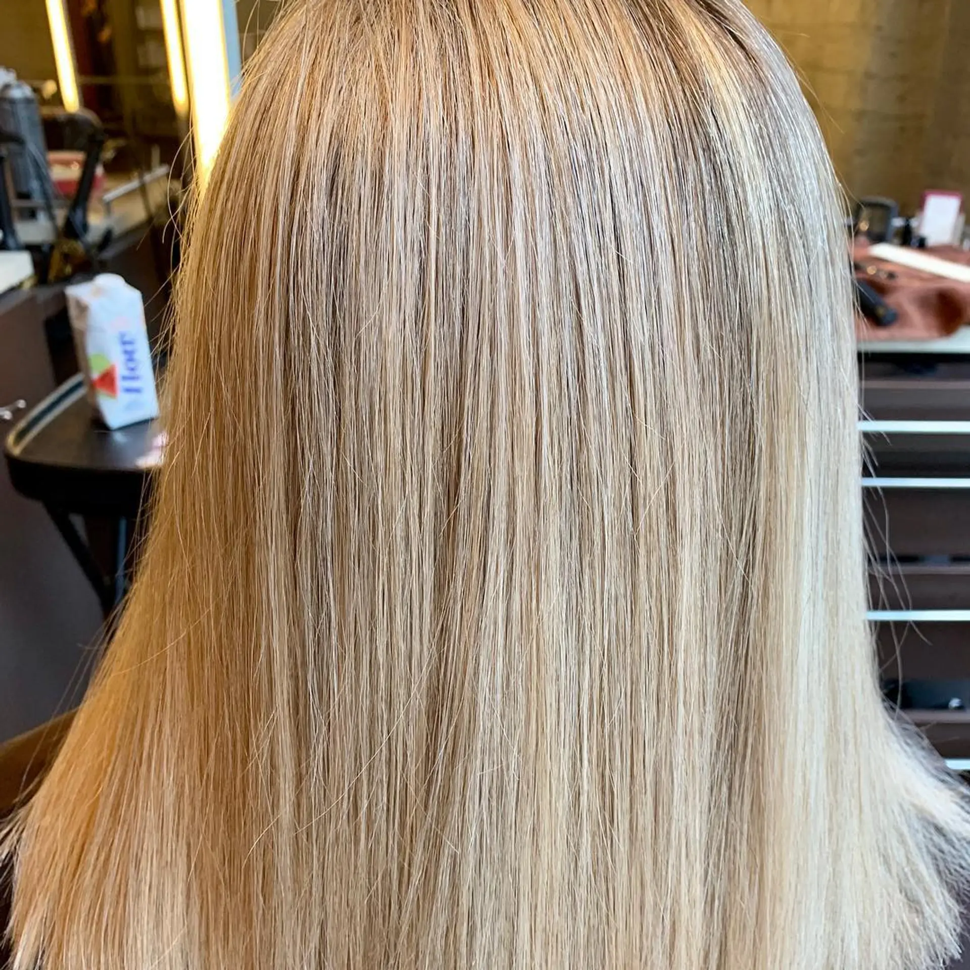 A long and straight icy blonde hairstyle. 1