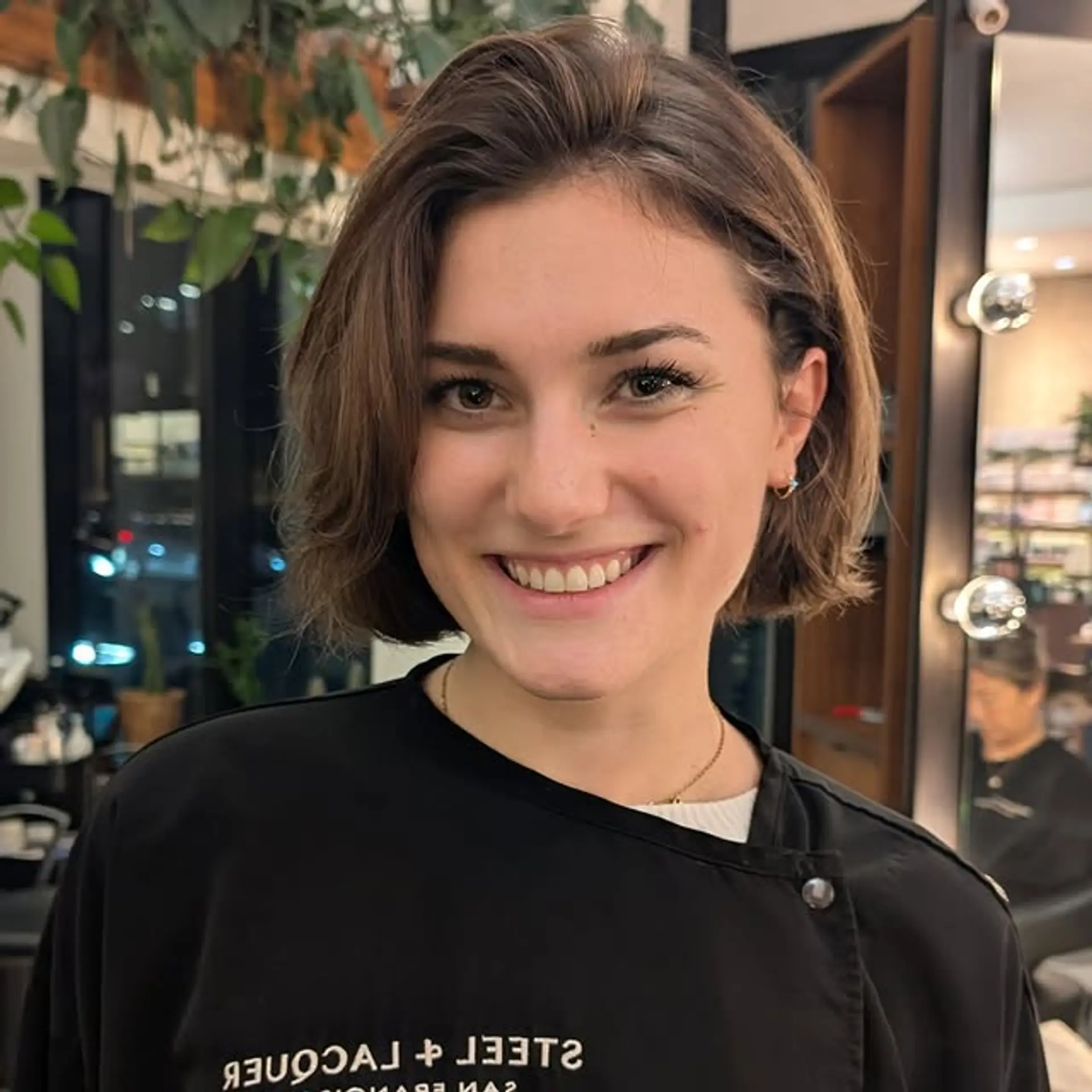 A modern shag bob with soft layers that enhance natural waves and create a textured, stylish look. 1