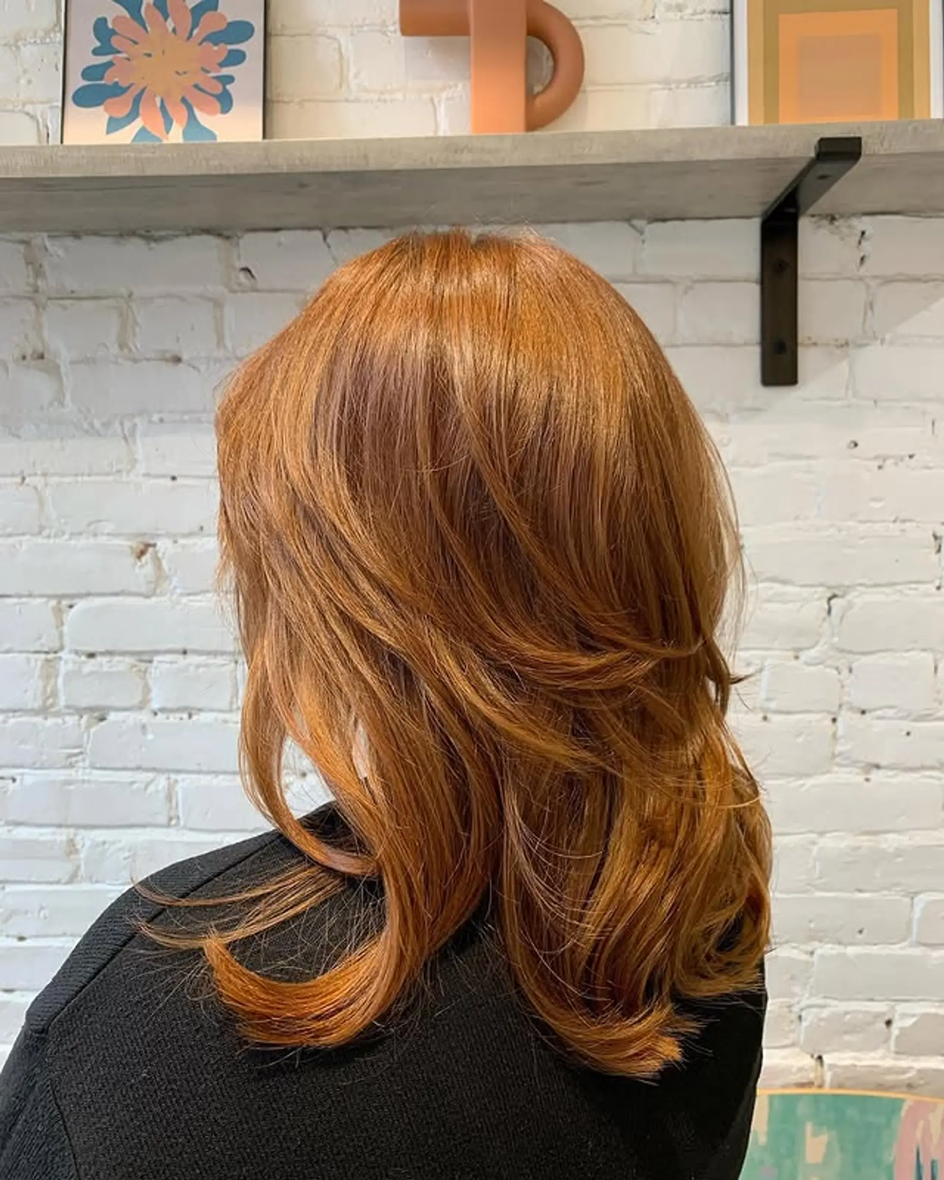 A medium-length layered cut with soft waves. 1