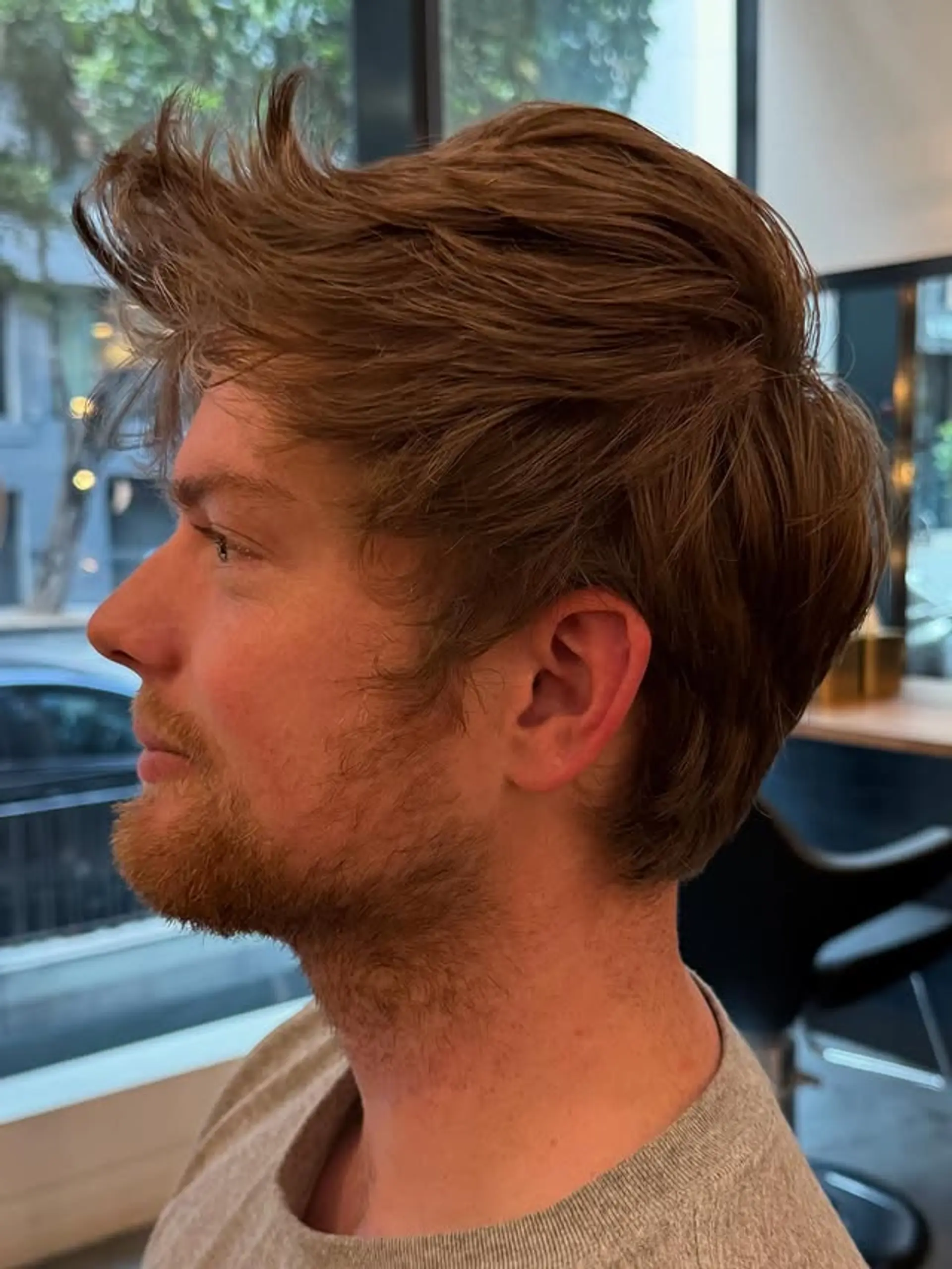 A textured top with a taper fade. 1