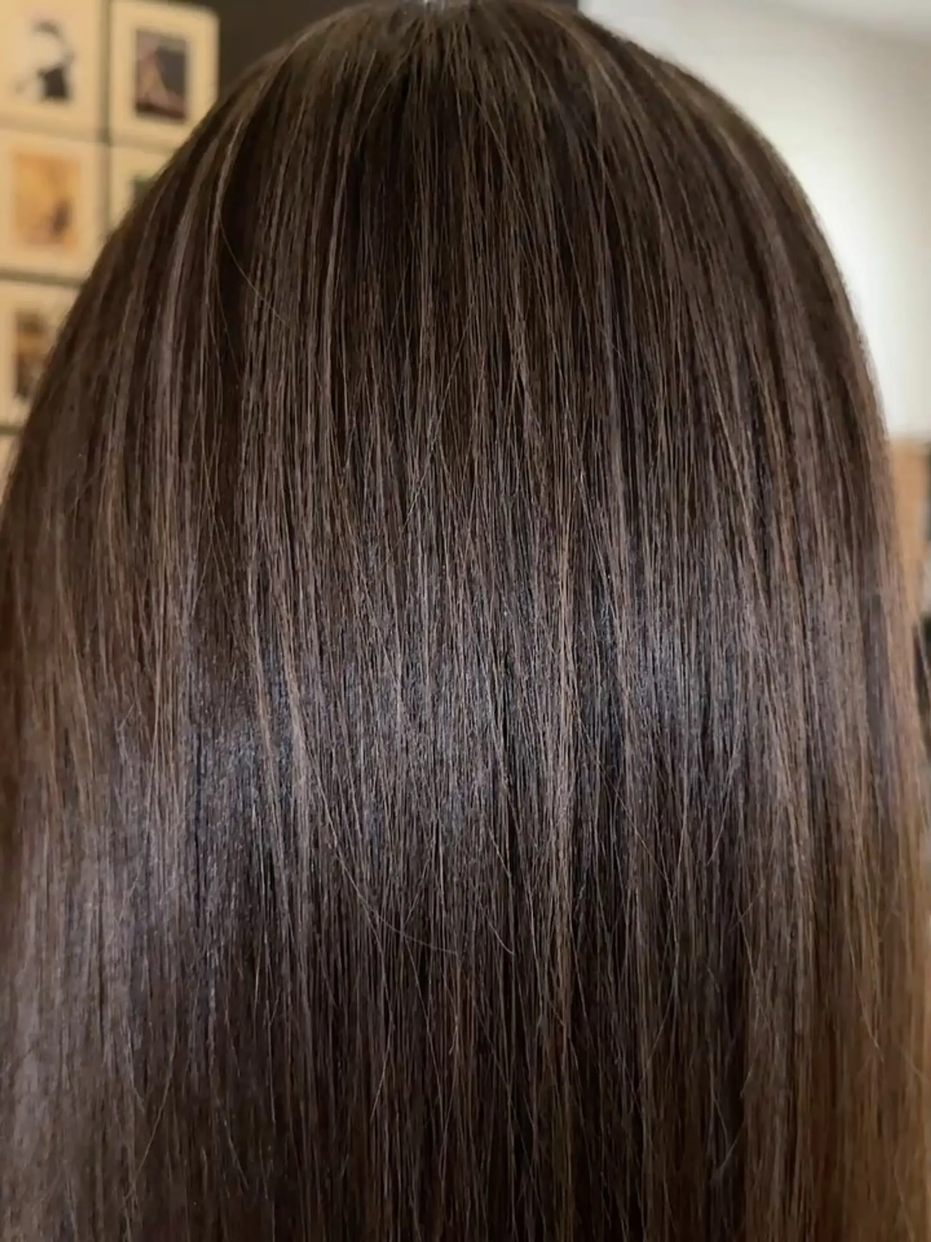 A smooth, natural-looking brunette hair color with a seamless blend. 1