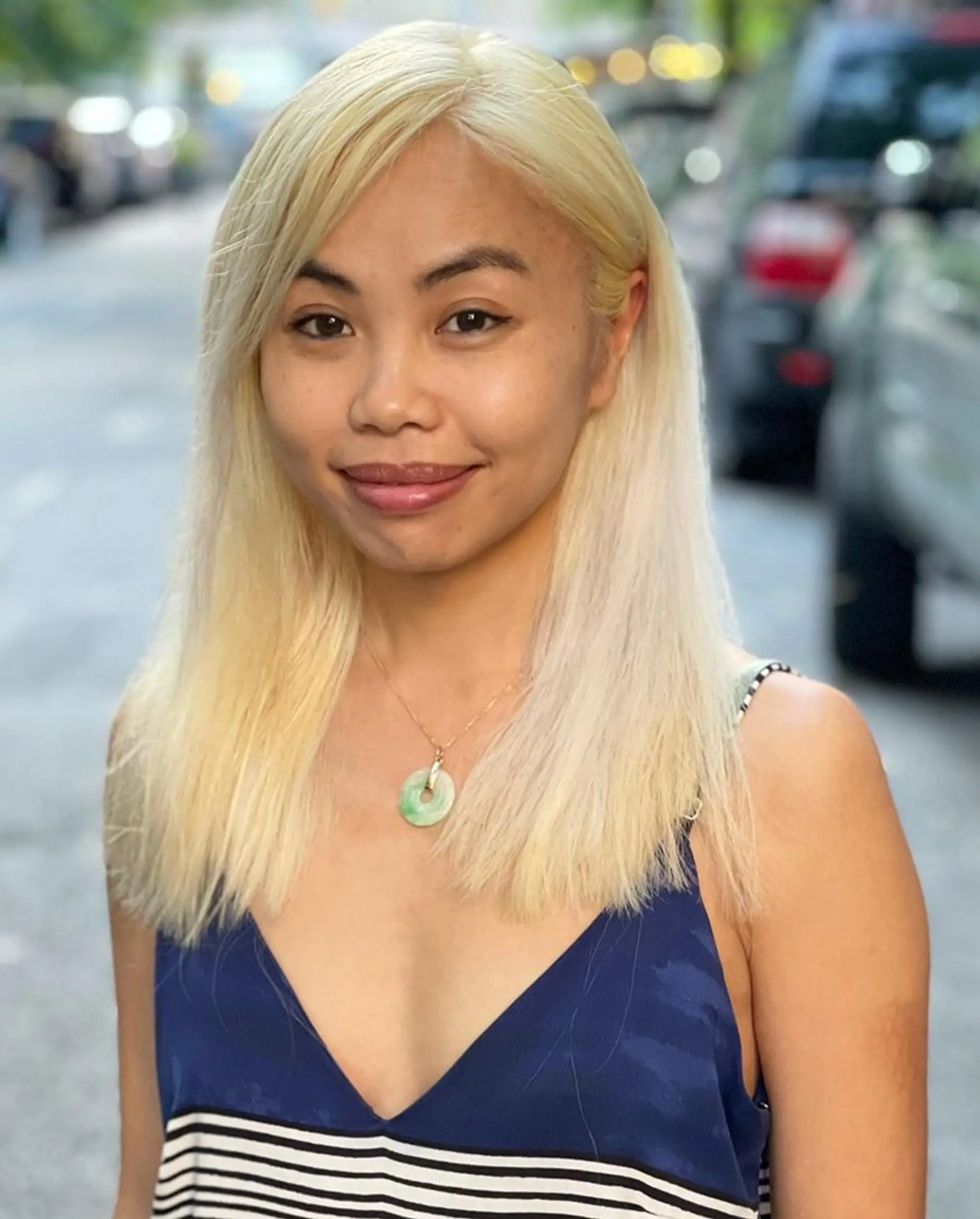 Long, straight platinum blonde hair with subtle layers. 1