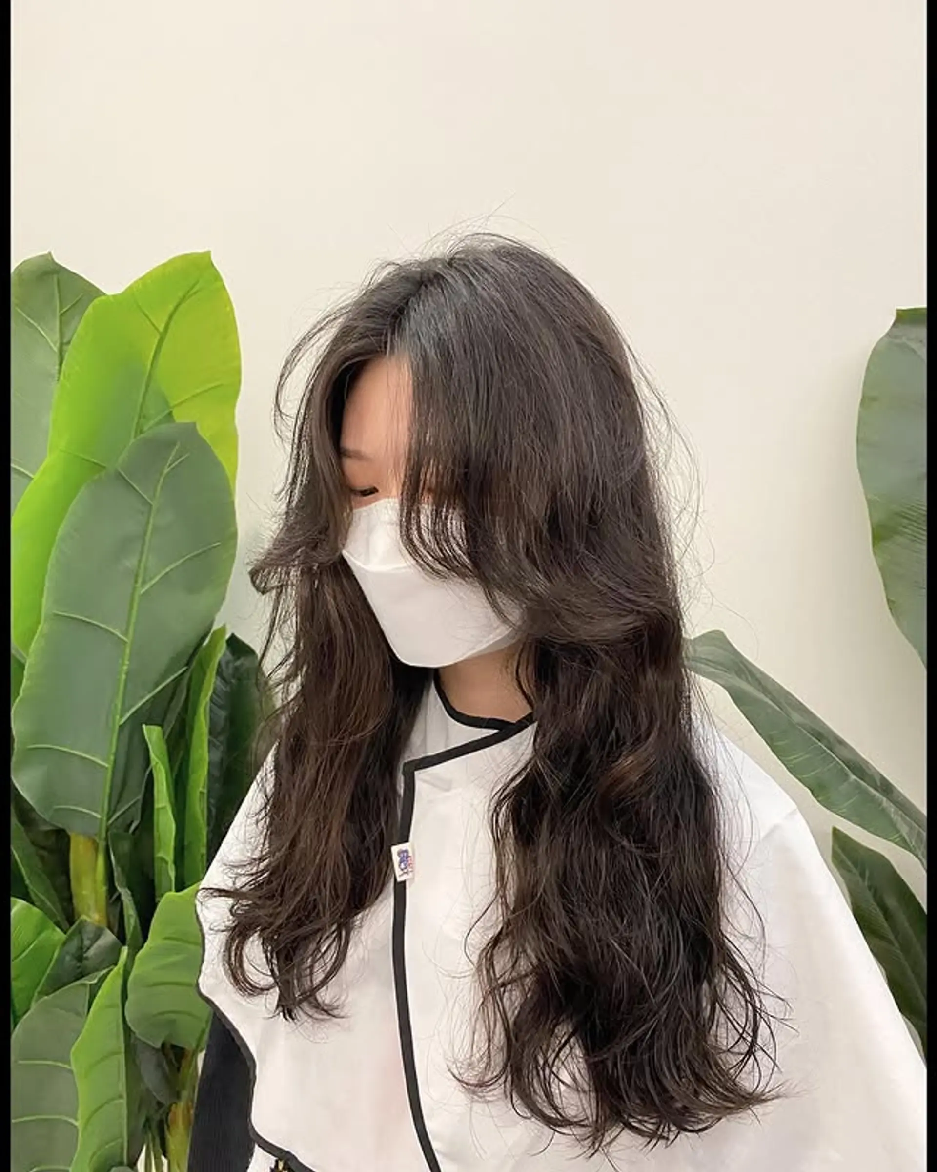 Long layered cut with wavy texture and see through bangs 1