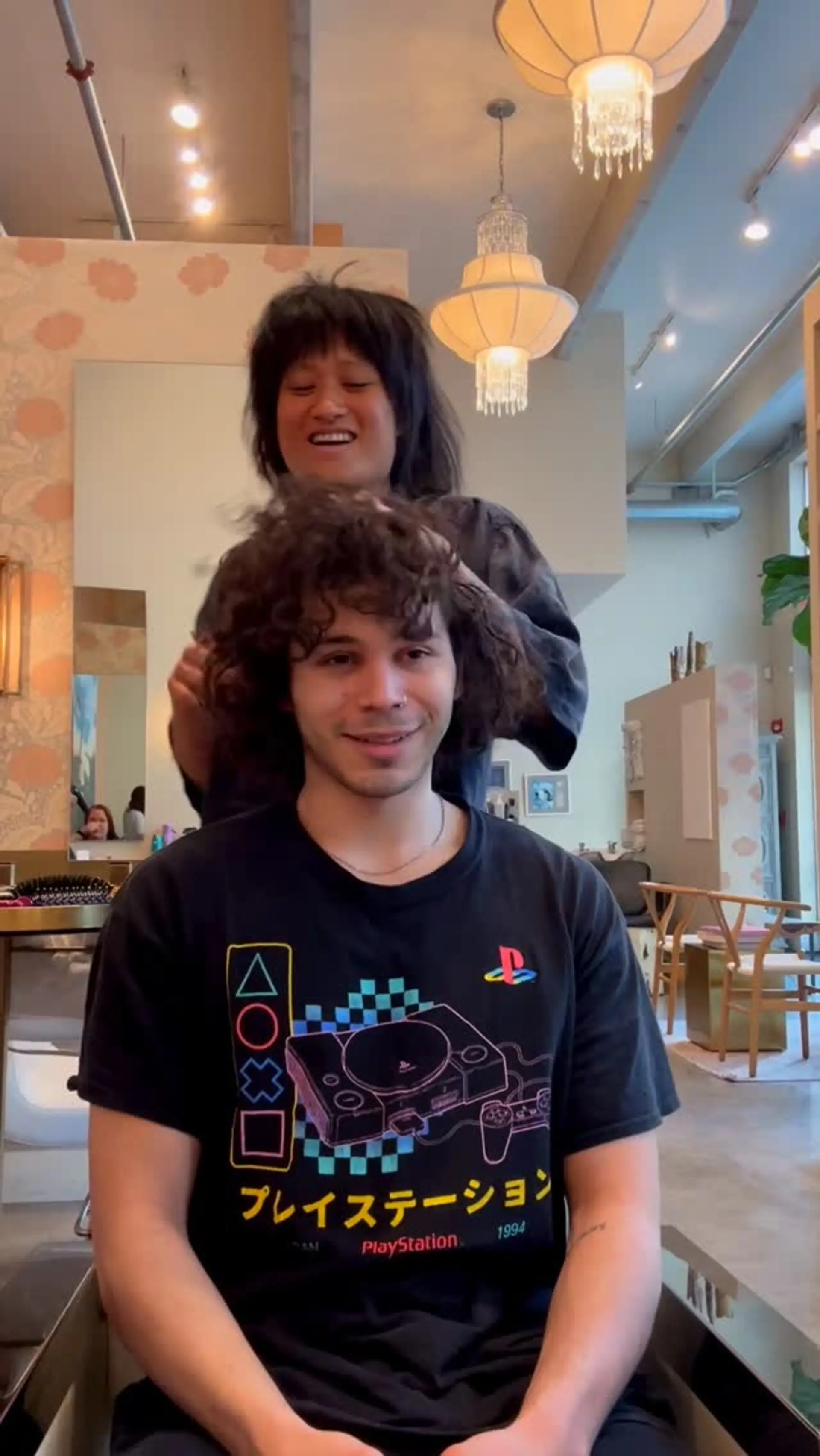 A medium-length textured curly haircut shaped with natural volume, fringe, and a modern shag silhouette. 1