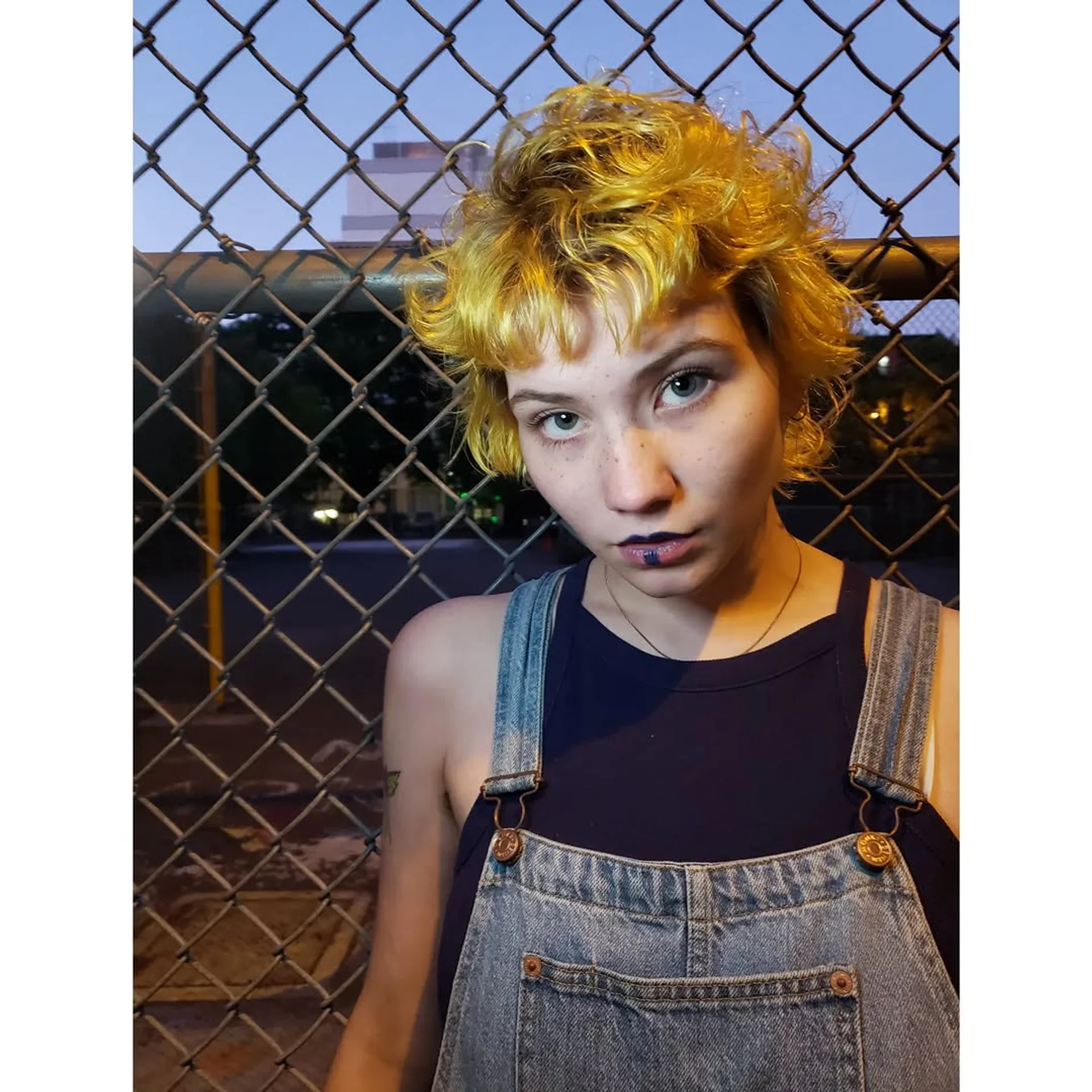 Edgy short punk mullet with choppy layers and neon green and black color contrast - Preview 3