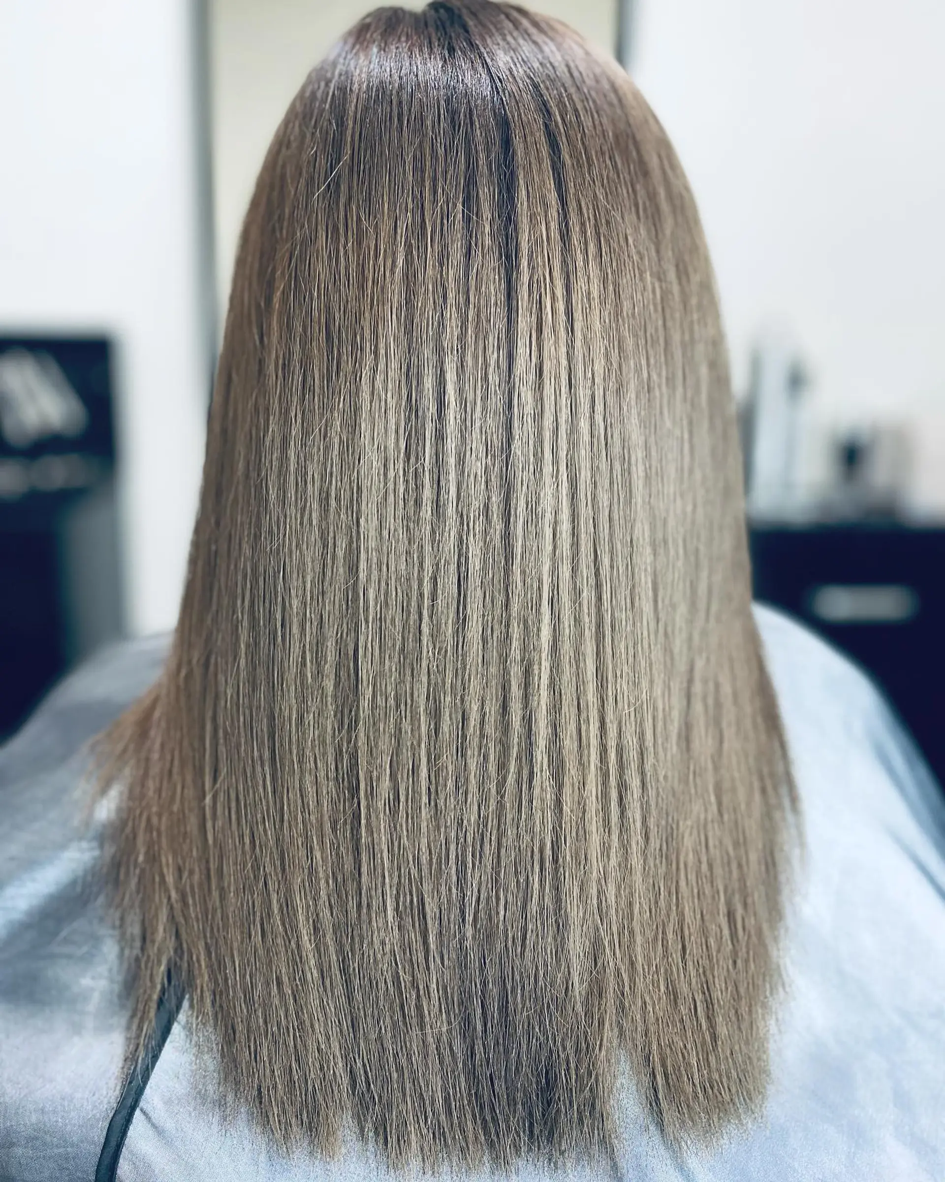 Long, straight hair with a silky texture. 1