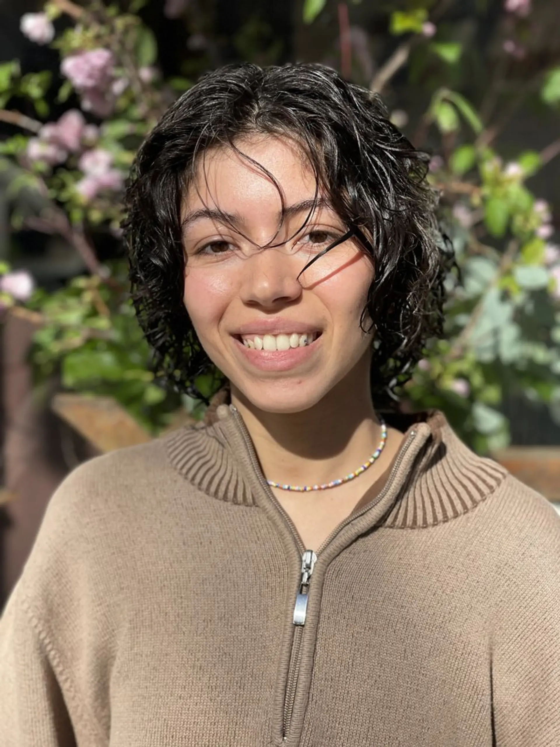 A stylish shag haircut with soft curls and choppy layers. 1