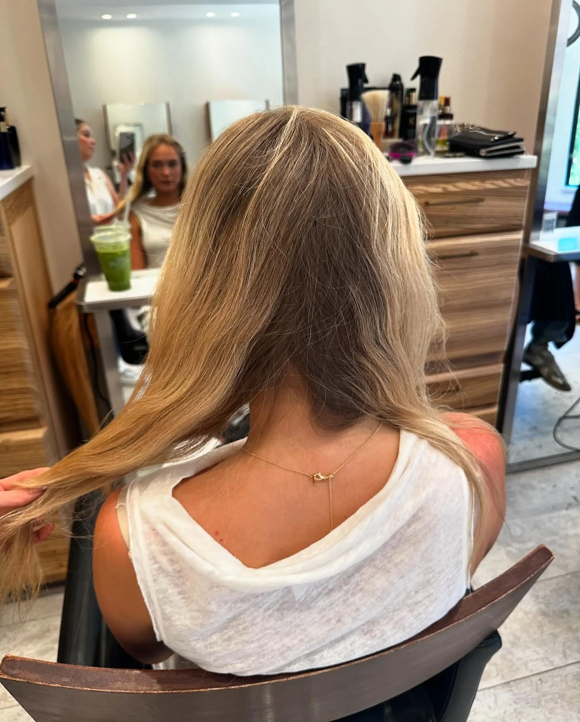 Long straight hair with seamless dimensional beige and honey blonde highlights. 1
