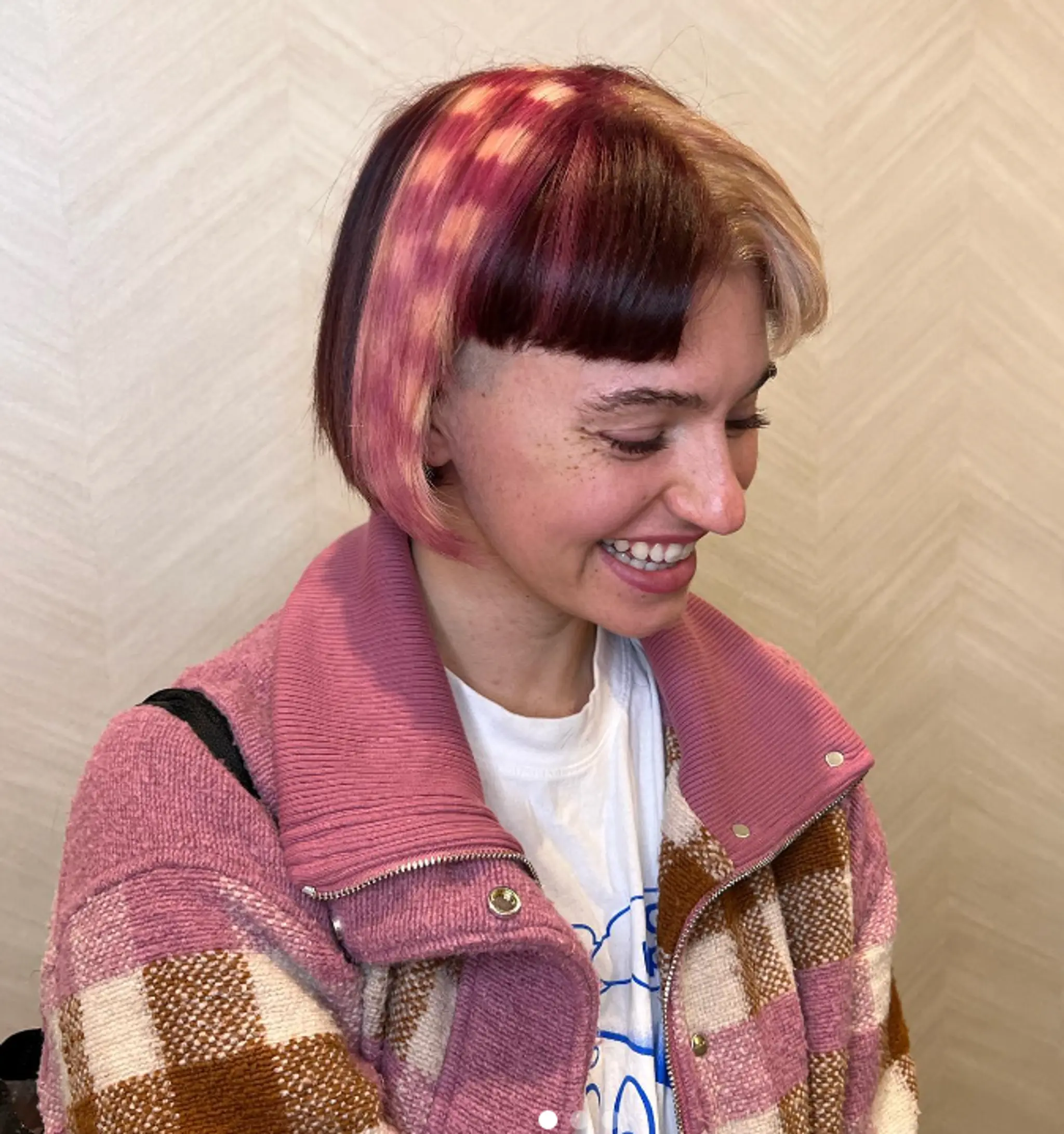 A short bob with a checkerboard pattern in pink and blonde, contrasted with natural brown roots.

Color by @simabeautynyc
Cut and style by @juliamannino_hair
