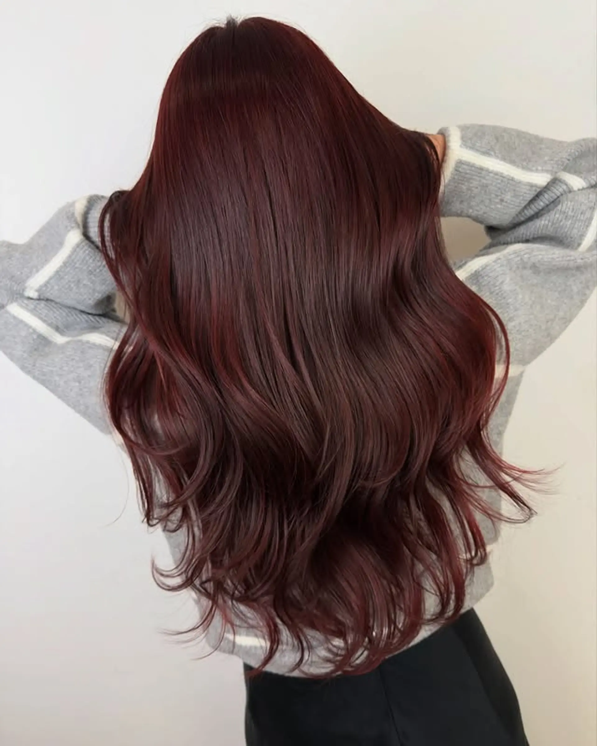 Long, layered waves with a glossy finish. 1