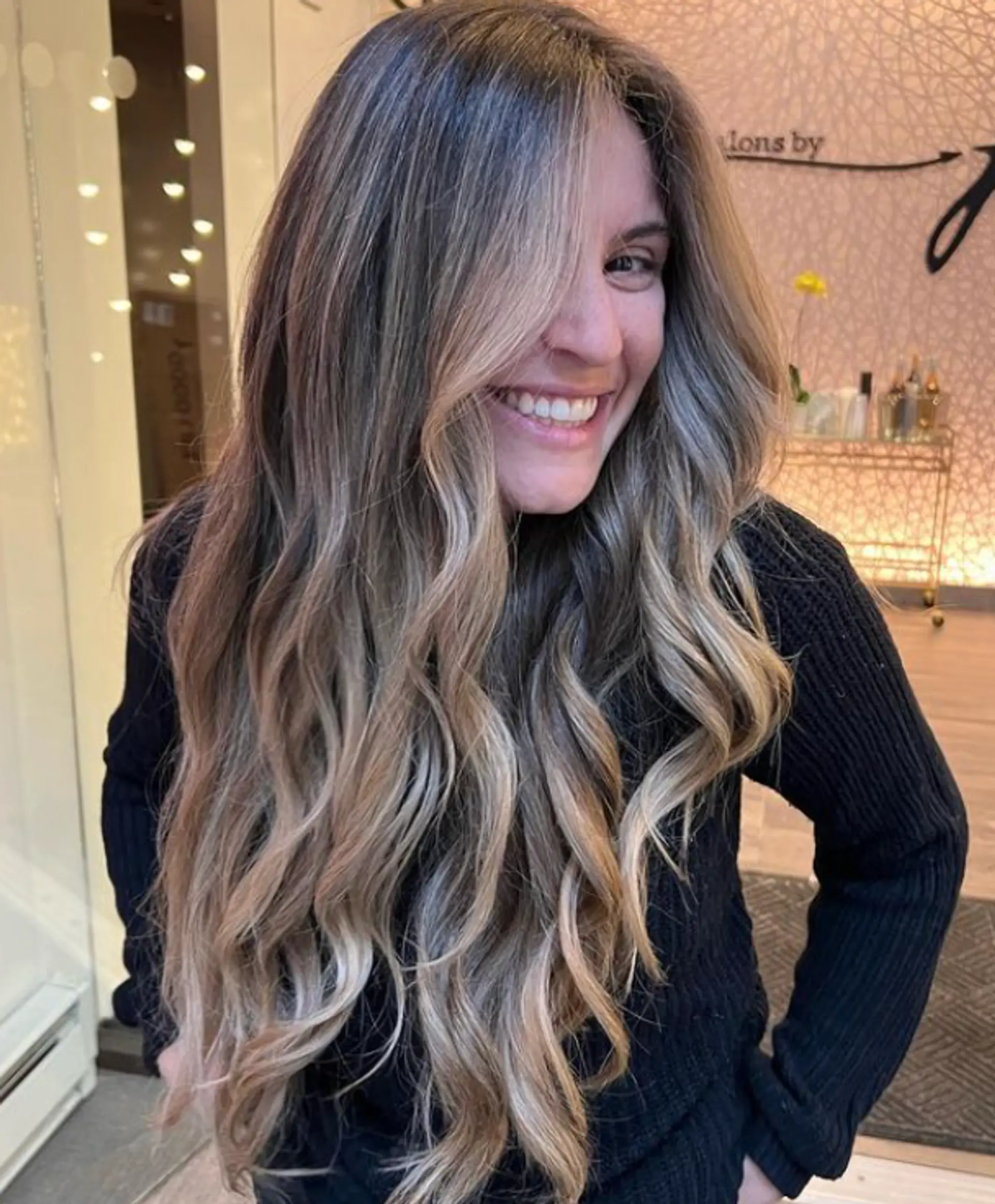A stunning 'Golden Wave Cascade' hairstyle featuring very long, soft waves with a rich combination of blonde and light brown shades. The style includes face-framing layers and natural-looking curls, creating a sun-kissed, sophisticated look.

Color by @simabeautynyc
Cut and style by @juliamannino_hair
 1