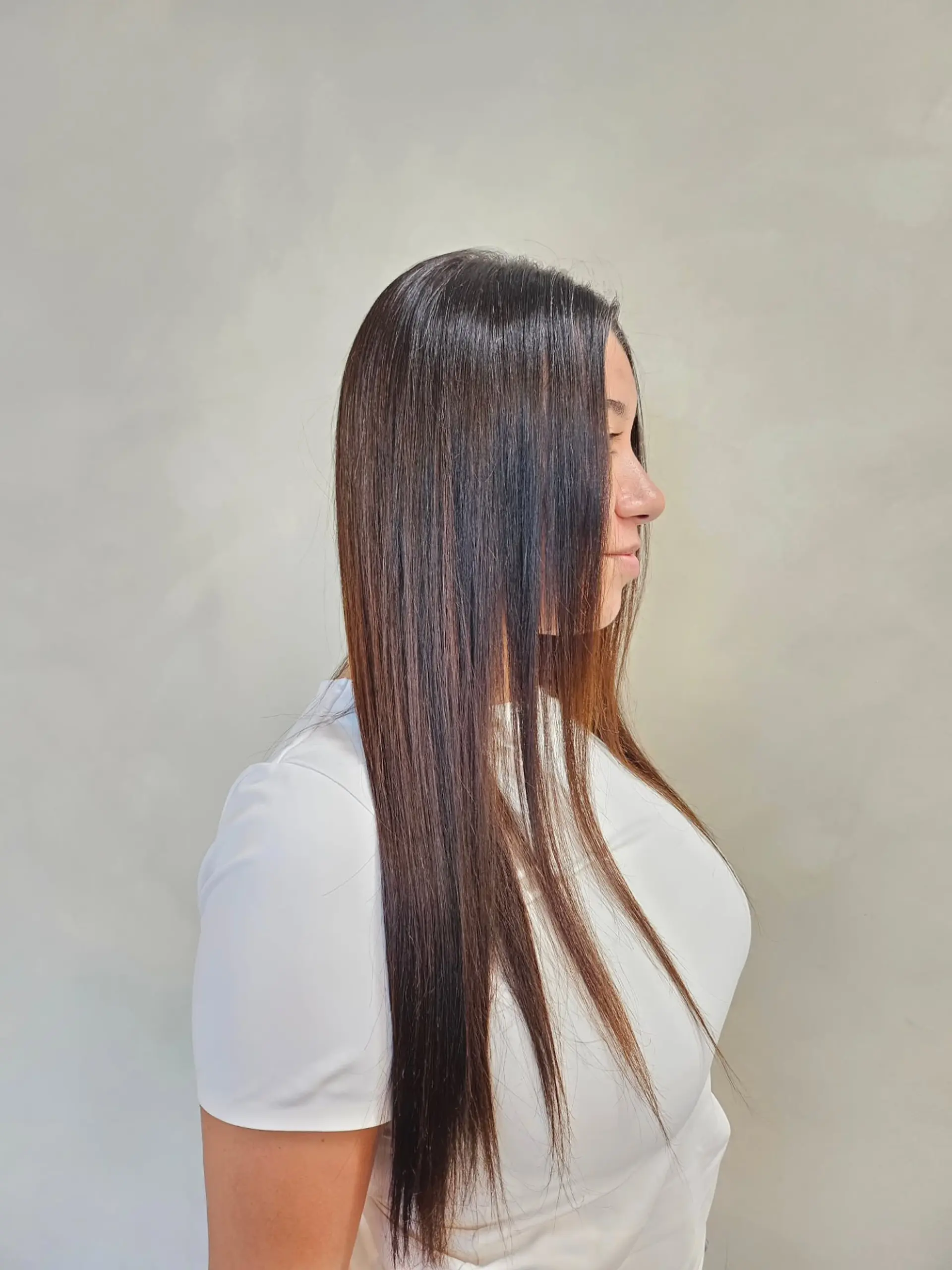 Ultra-sleek, pin-straight long hair with a smooth, glossy finish. 1
