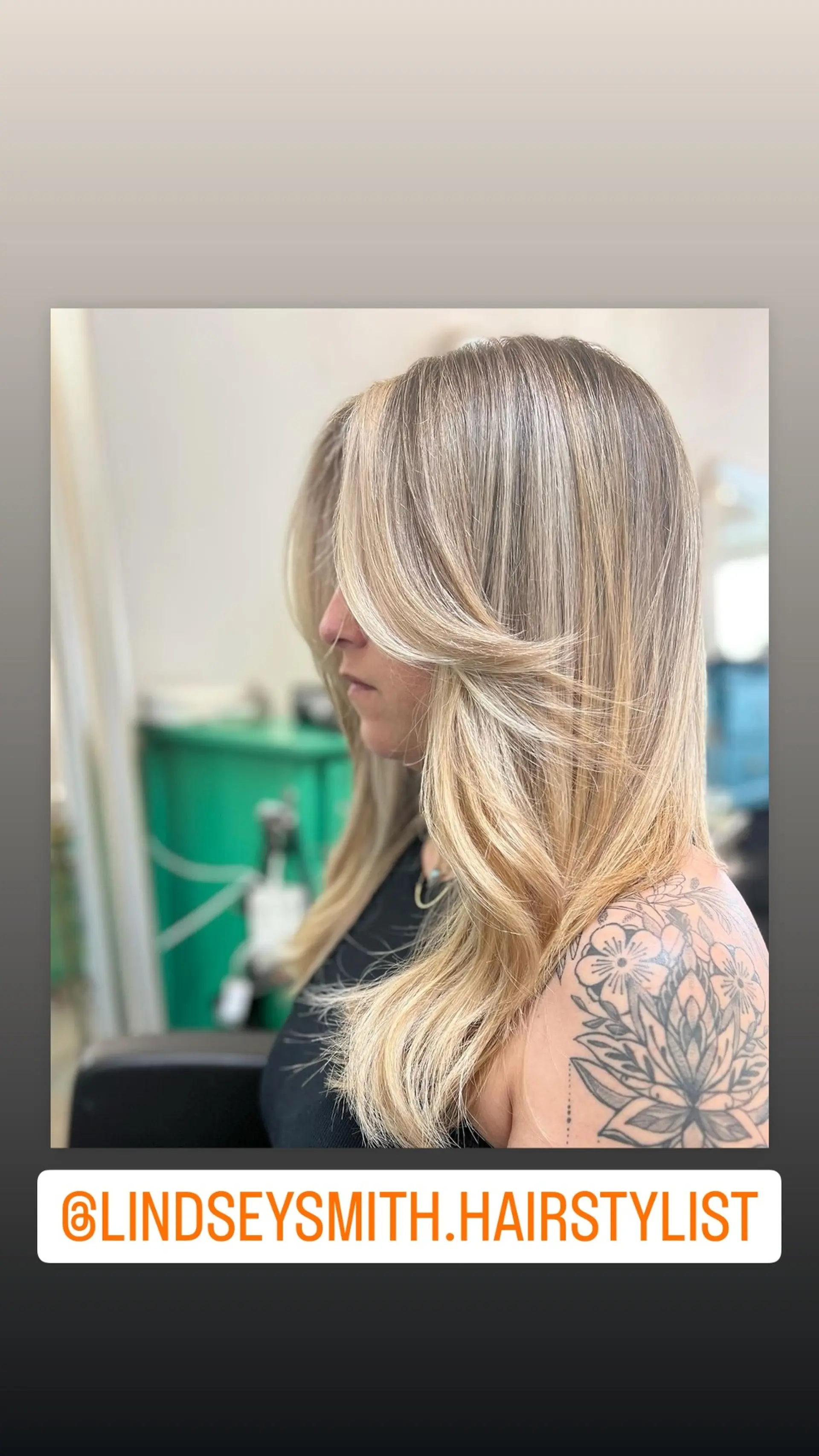 This is a medium length cut with curtain bangs and face framing layers. 1