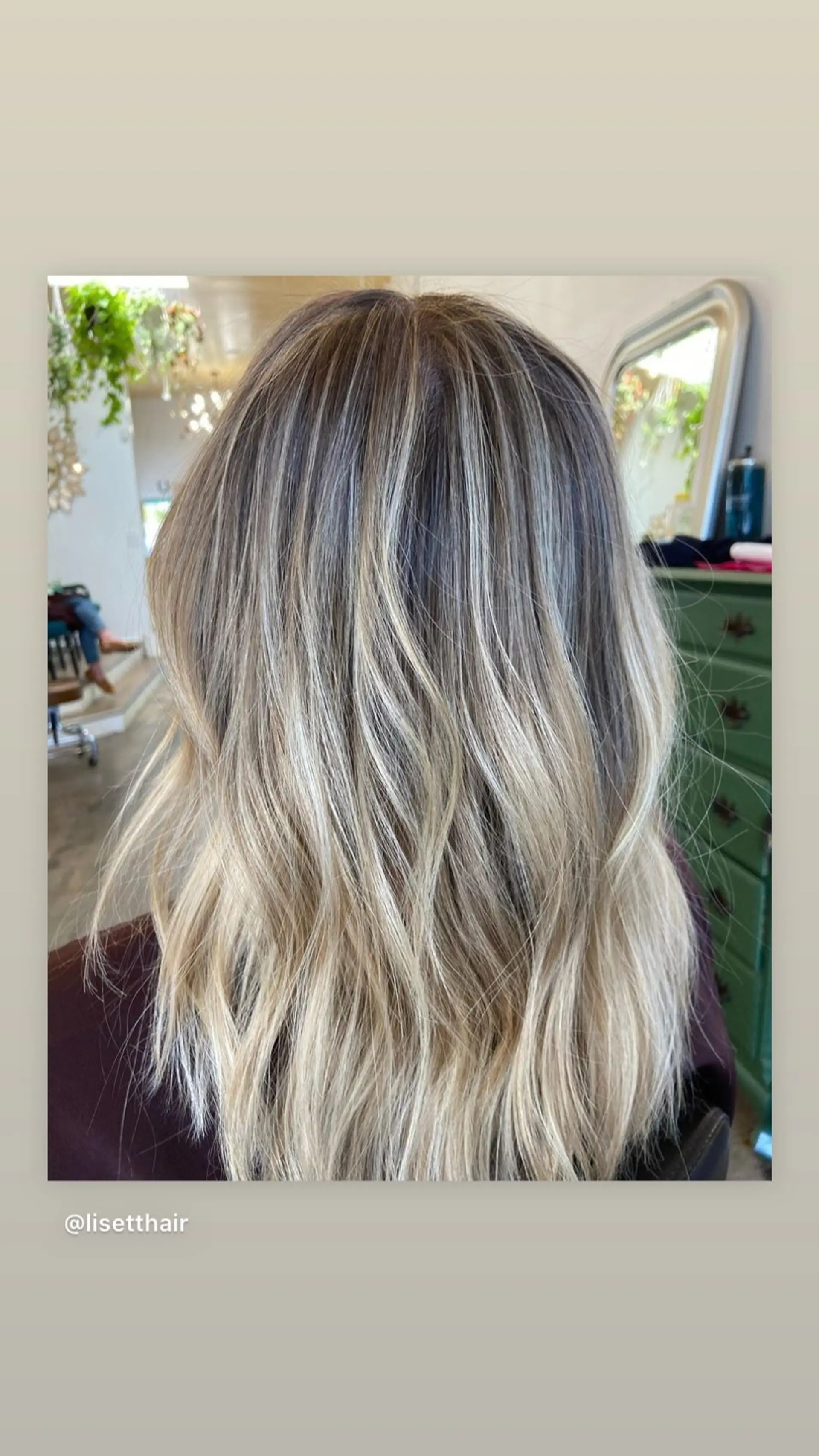 A stunning medium-length wavy hairstyle with a sun-kissed balayage effect. 1