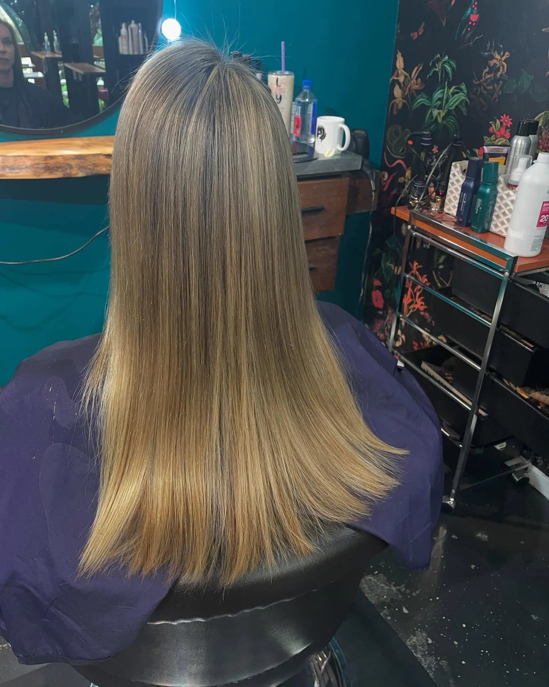 Long, pin-straight hair featuring seamless golden blonde highlights blended into a light brown base with a sleek finish. 1