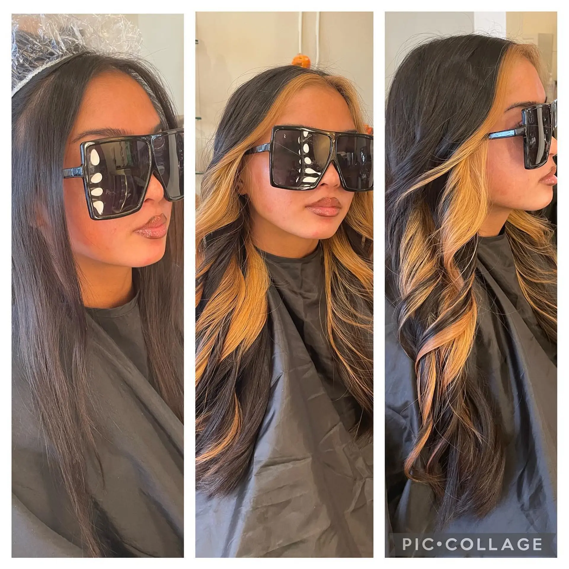 Long dark brown hair featuring a bold golden blonde money piece and face-framing highlight styled in soft waves. 1