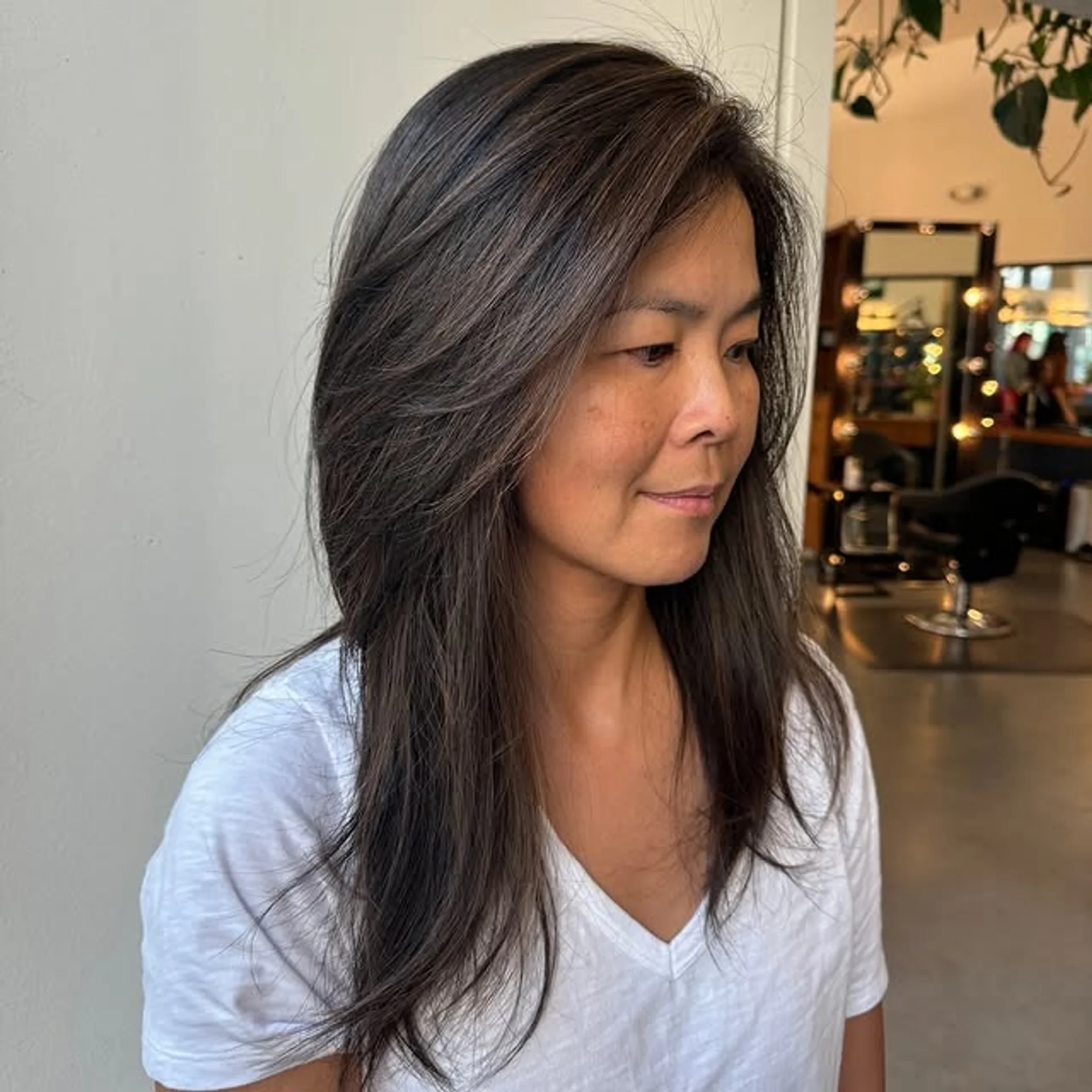 Medium length layered haircut with straight styling and dimensional highlights - Preview 2